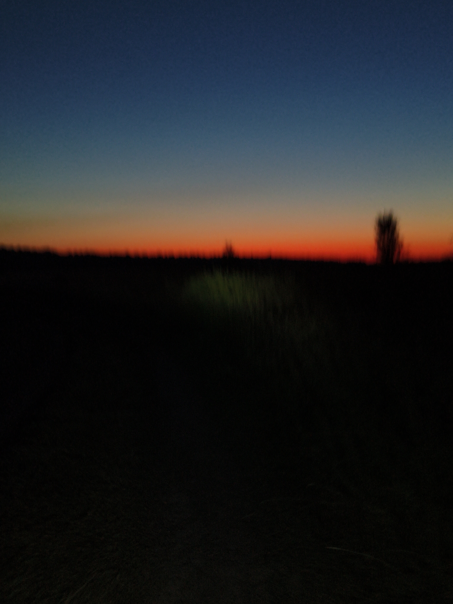Slow dirt-path ride at sunset, sky going full orange