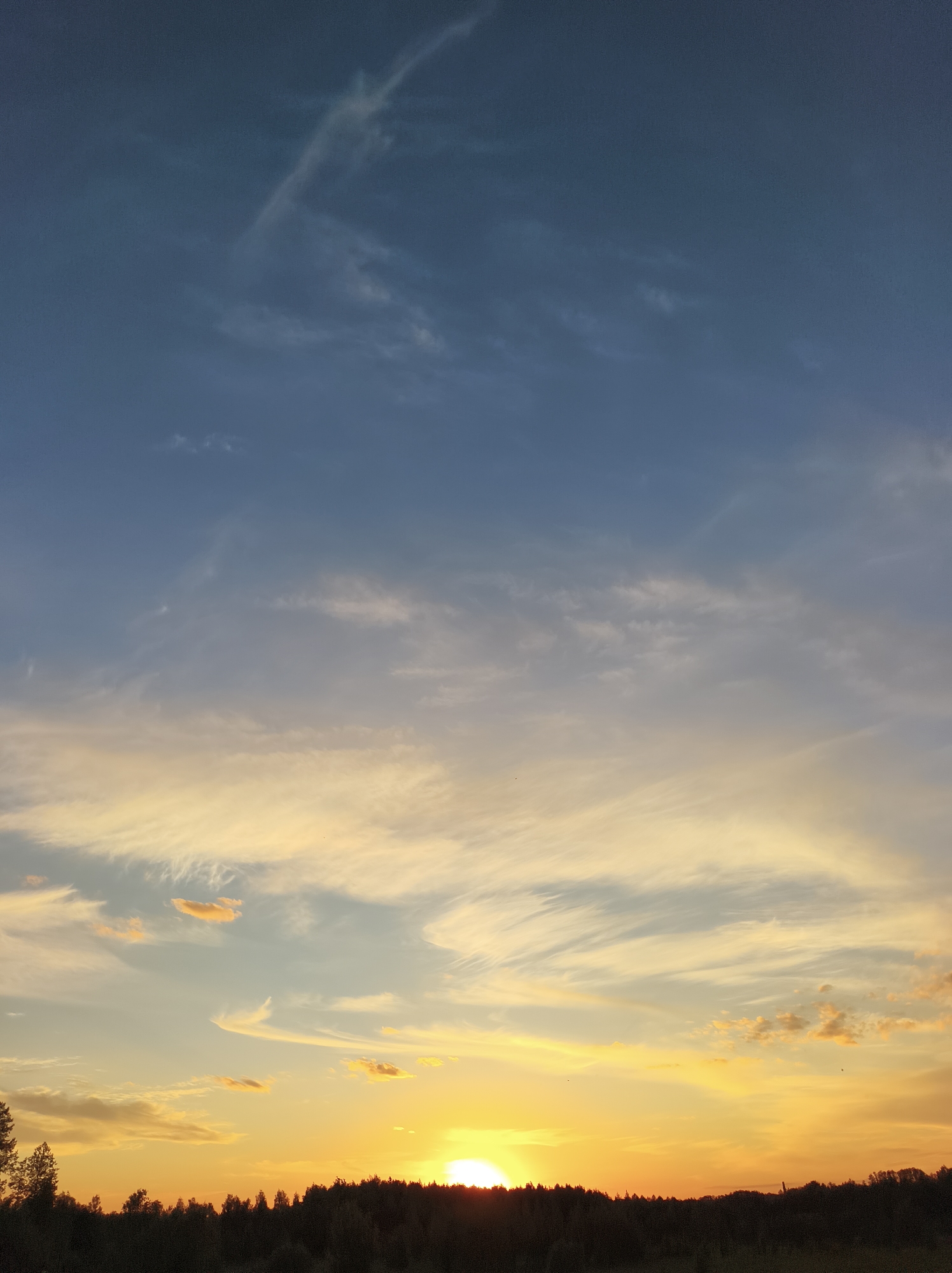 Sunset observed over rural Vyshevychi, Ukraine countryside