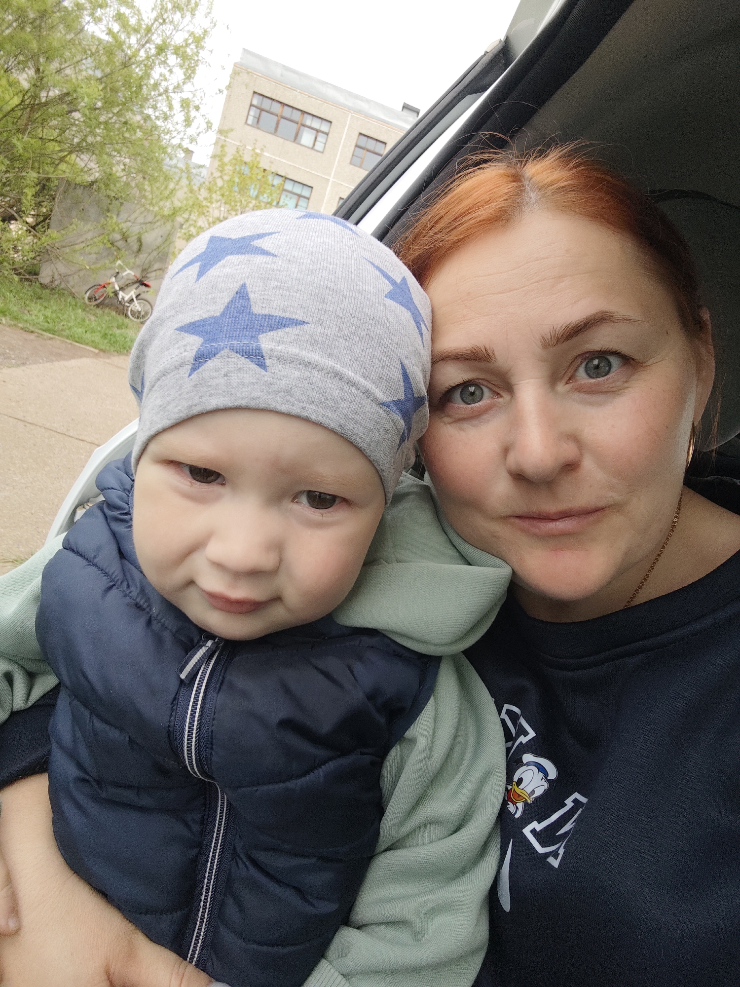 Mother and child photographed in vehicle in Markovskii