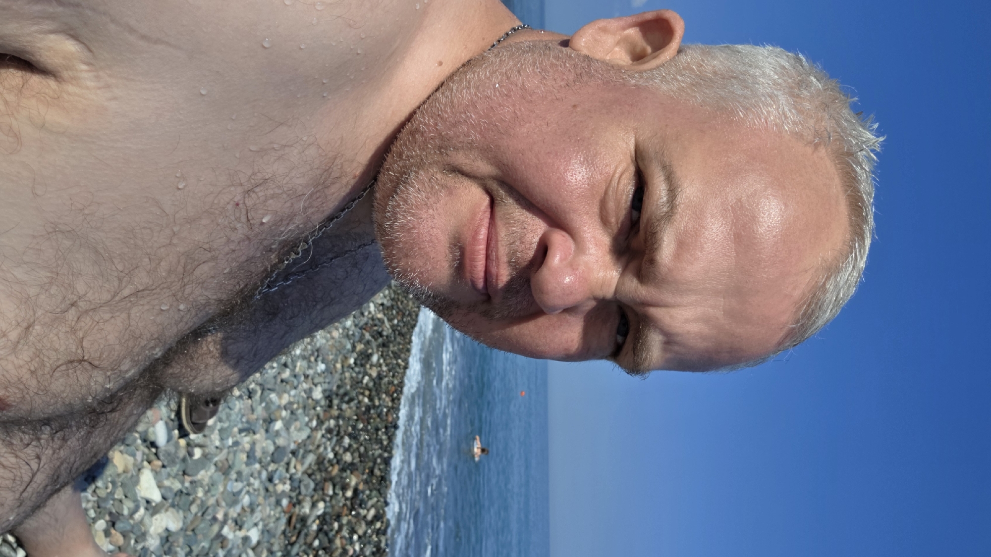 Summer morning on Batumi's Black Sea pebble beach