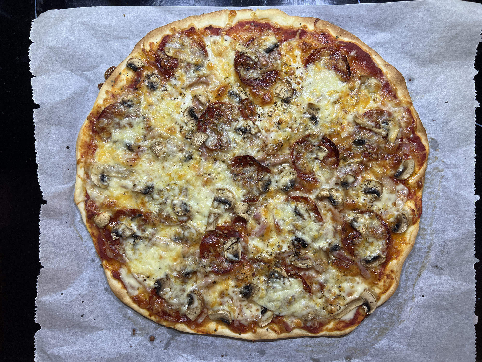 Fresh pizza prepared and seasoned in Mollet Del Vallès