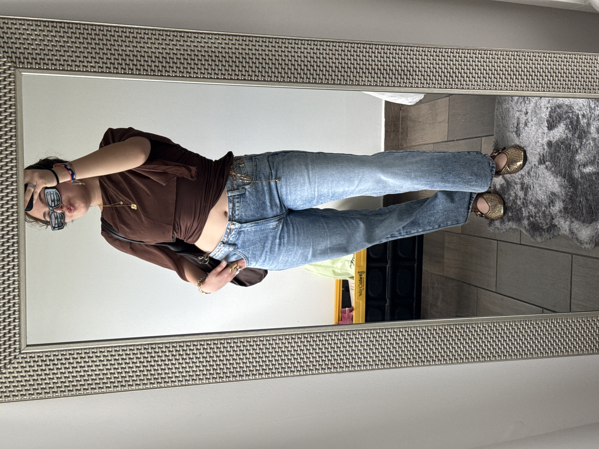 Woman takes mirror selfies in Mexico City apartment