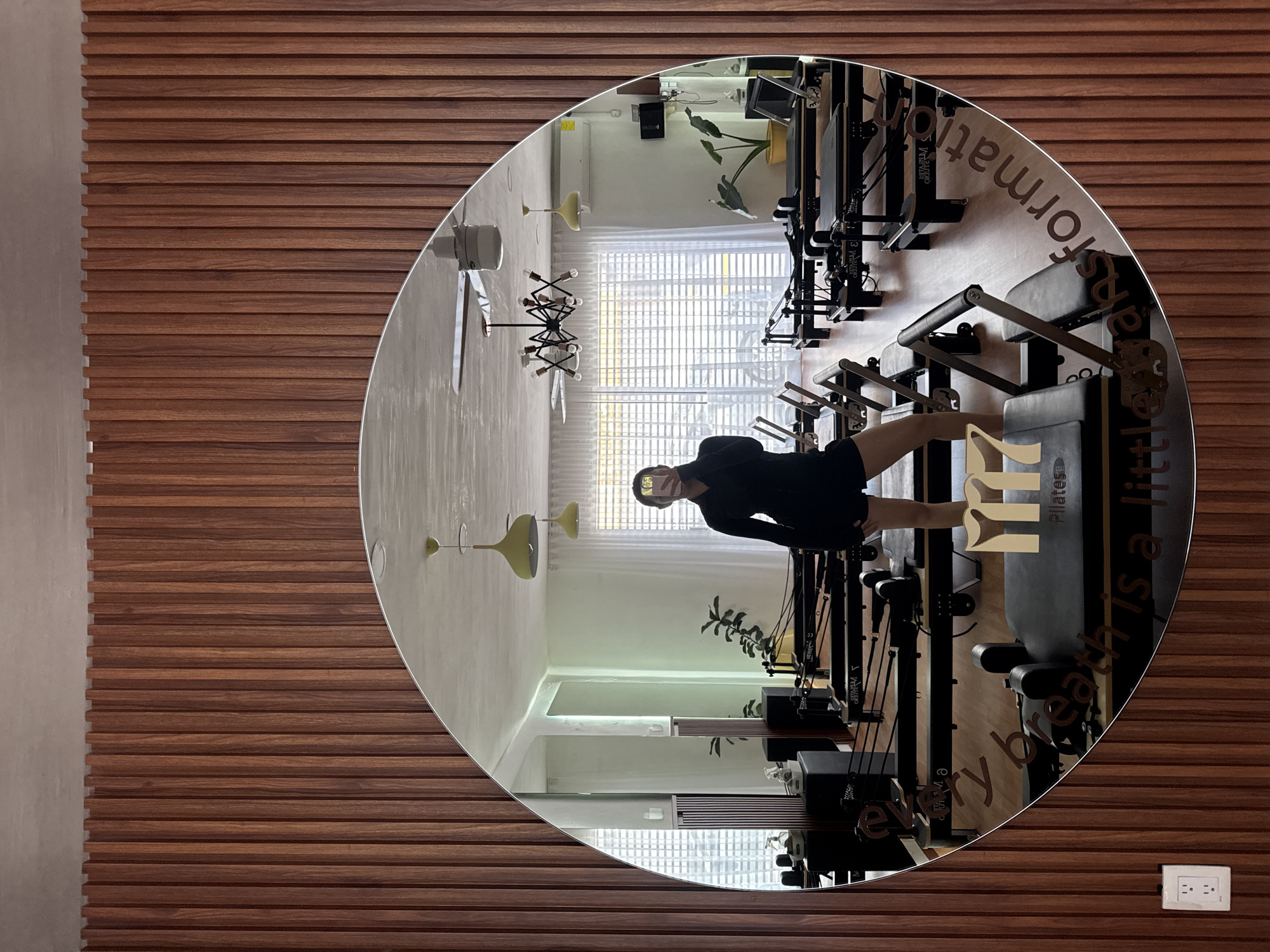 Pilates session documented at mirrored studio in Puebla