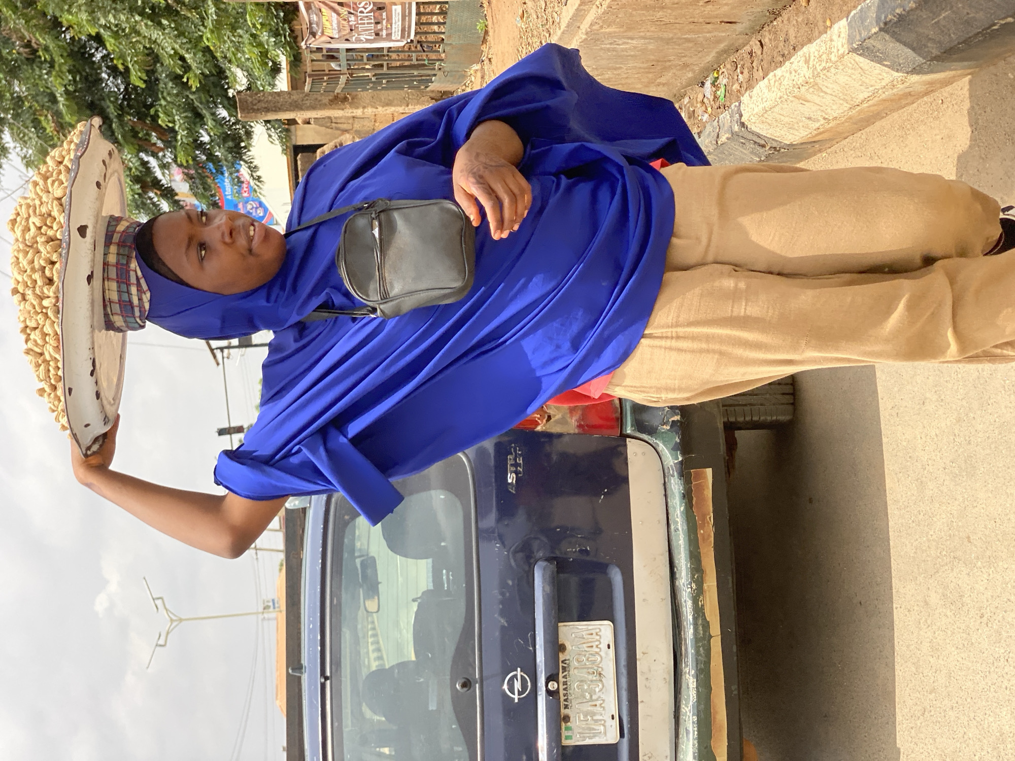 Street vendor conducts business in Kafanchan B, Nigeria