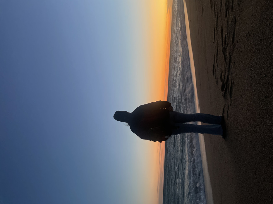 Sunset beach activity captured in Calella, Spain