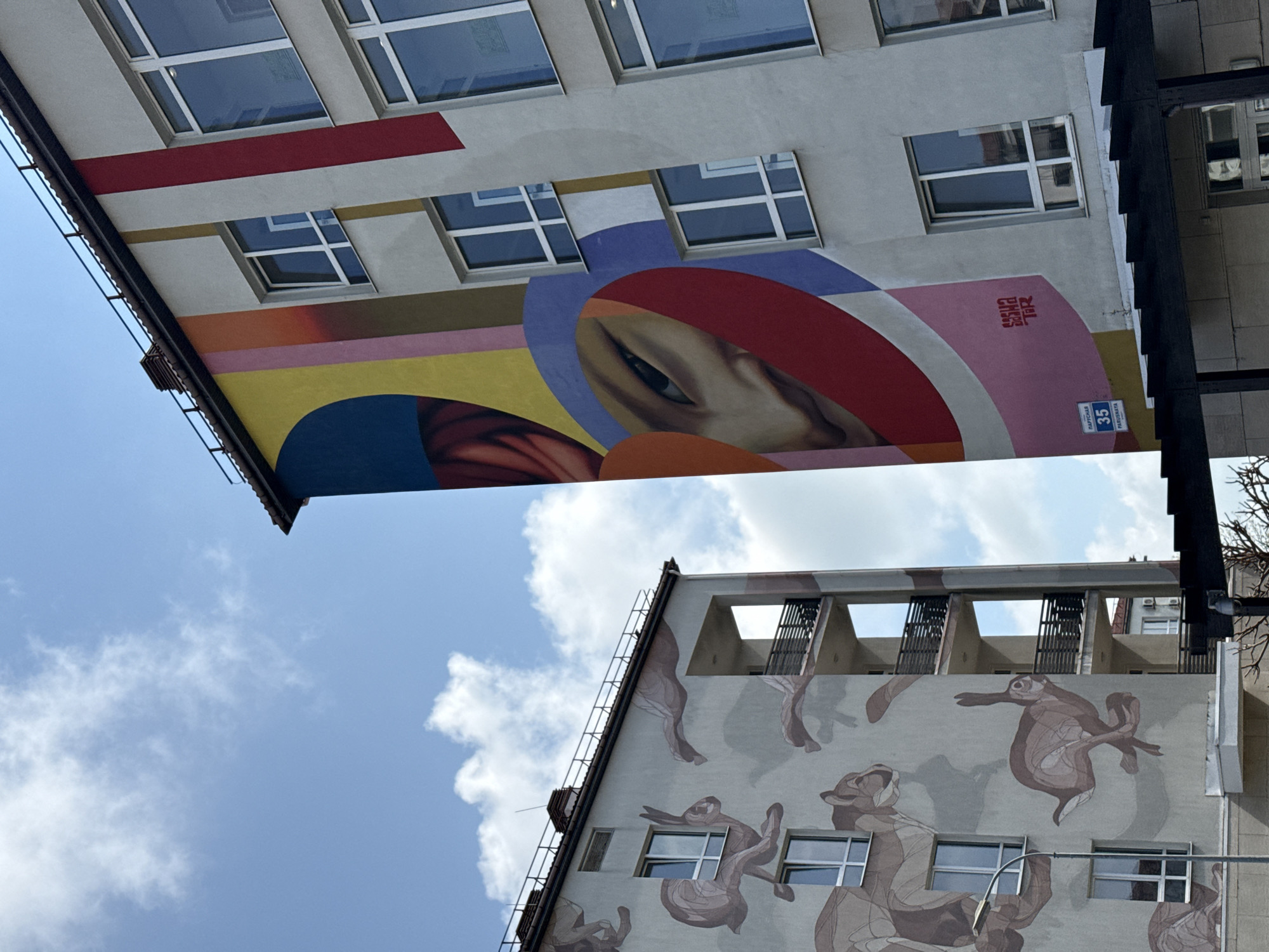 Urban scenes documented in Sirius, Russia including murals, Olympic rings