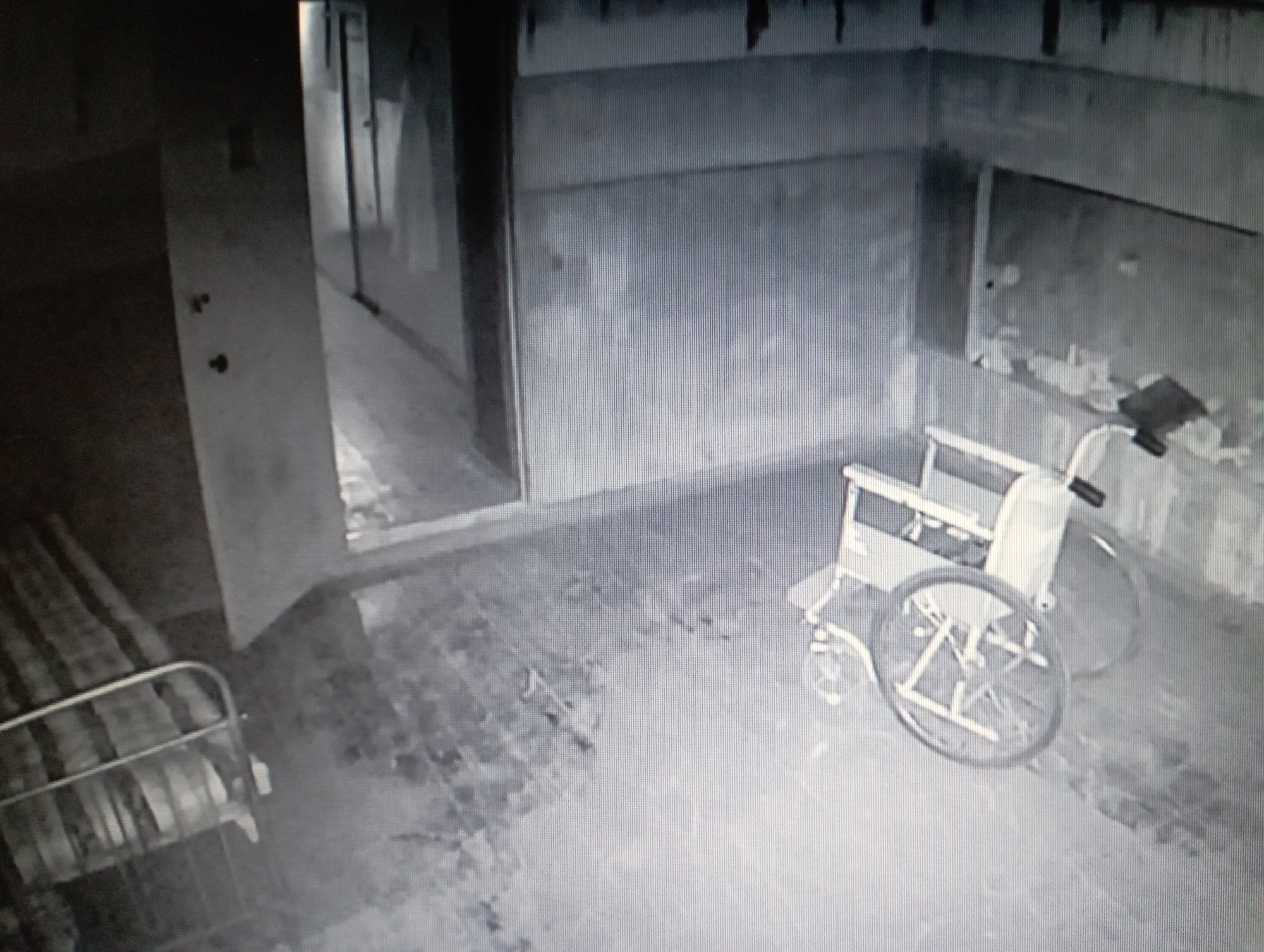 Inside an abandoned Bishkek building, late-night security footage