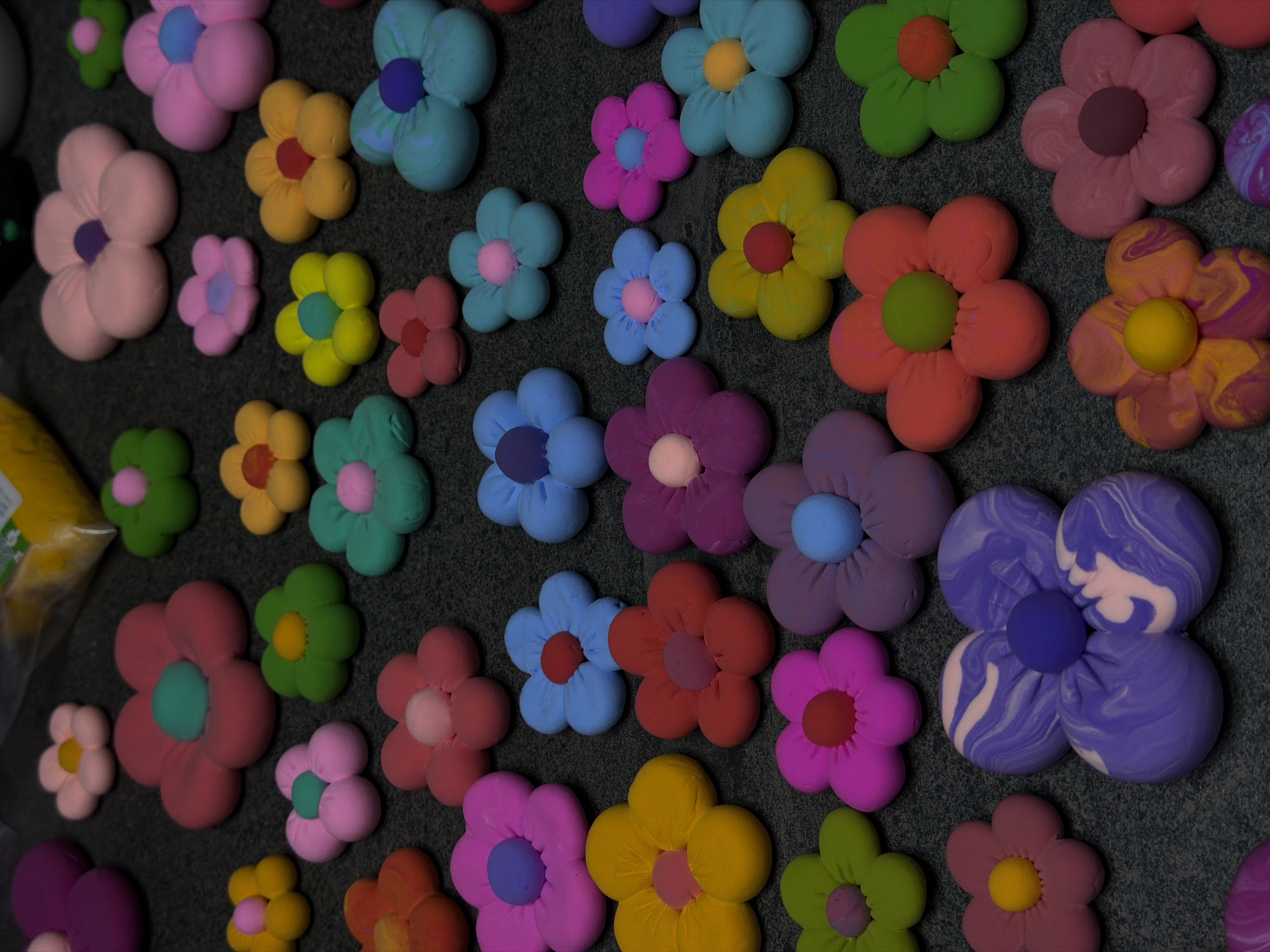 Handmade clay flowers displayed in colorful arrangement in Krasnoyarsk