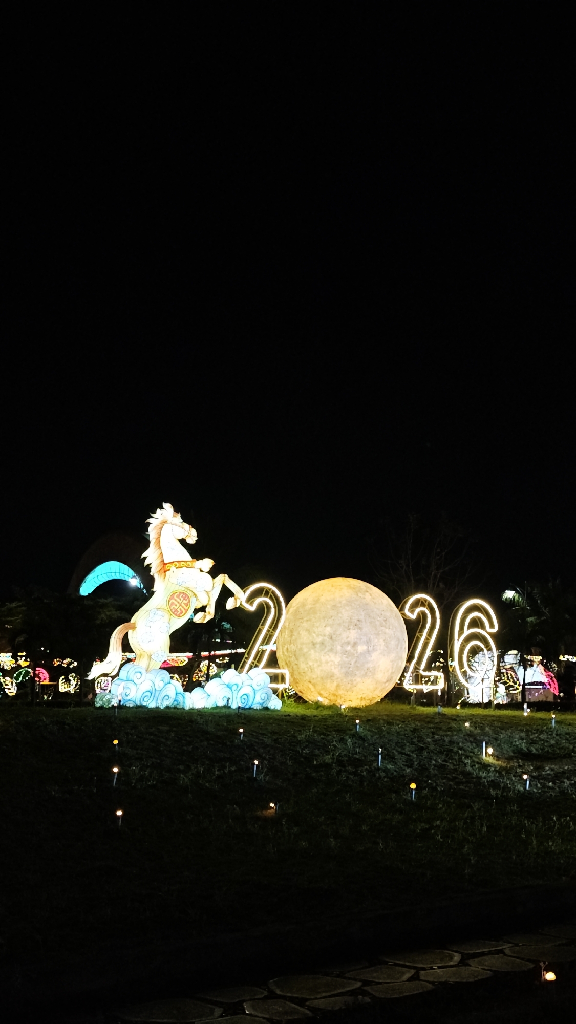 Nighttime festival celebrations illuminate Hội An Ward streets with decorative displays