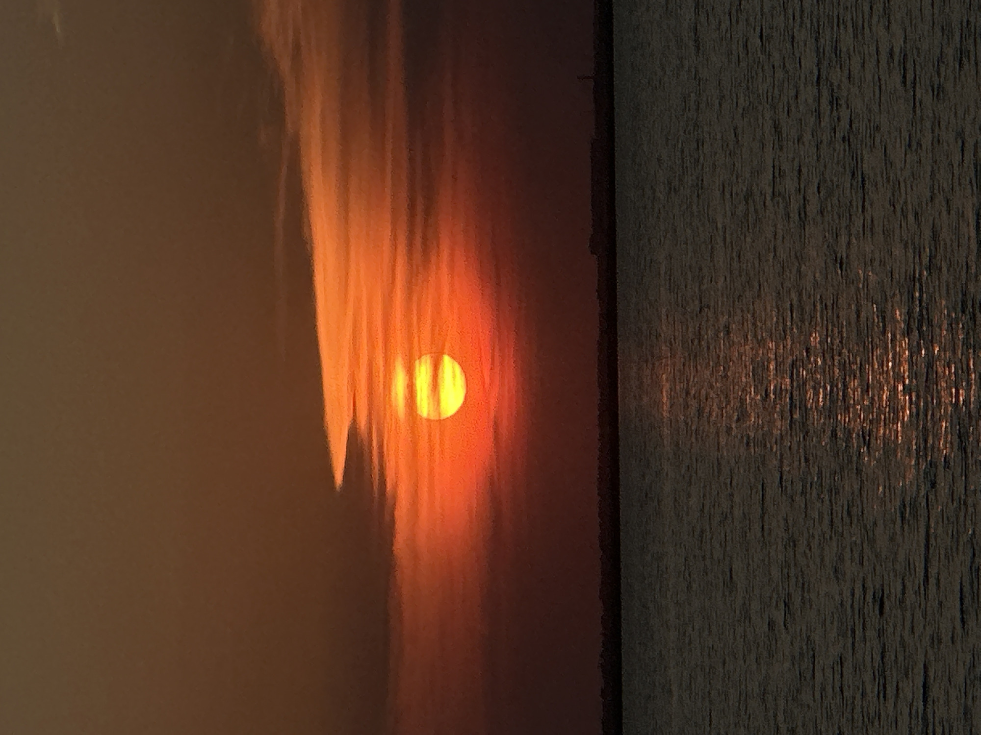 Golden sunset reflects across a Kokshetau lakeside