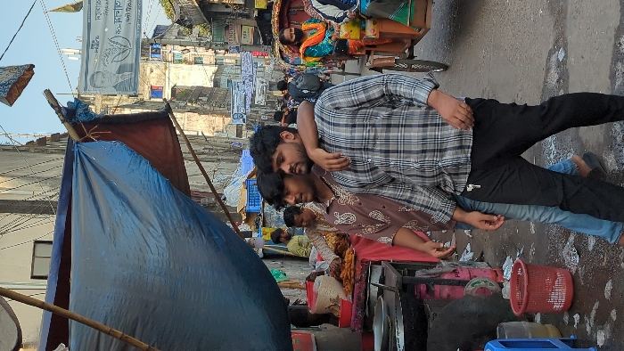 Typical morning street commerce documented across Dhaka commercial districts