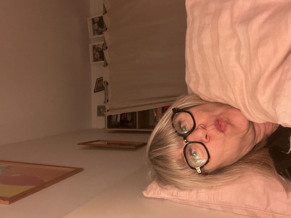 Woman documents intimate evening bedtime routine in French bedroom