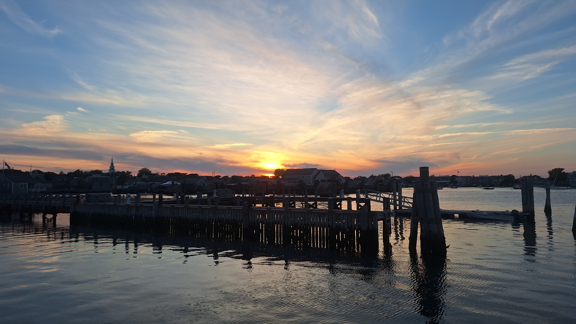Nantucket Harbor at golden hour, shot from multiple angles