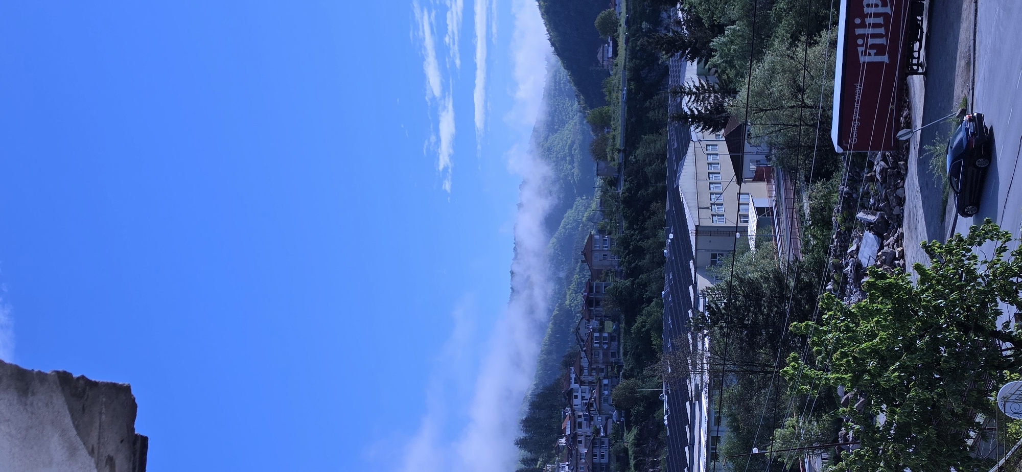 Morning fog shrouds mountains in Rudozem, Bulgaria