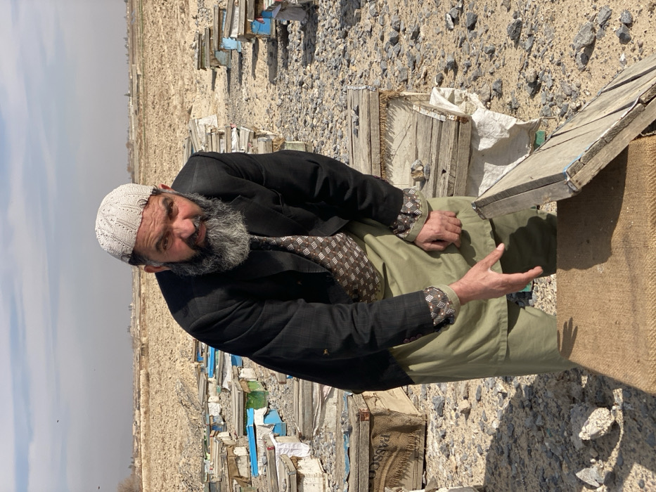 Beekeepers tend hives in Afghanistan apiary operation