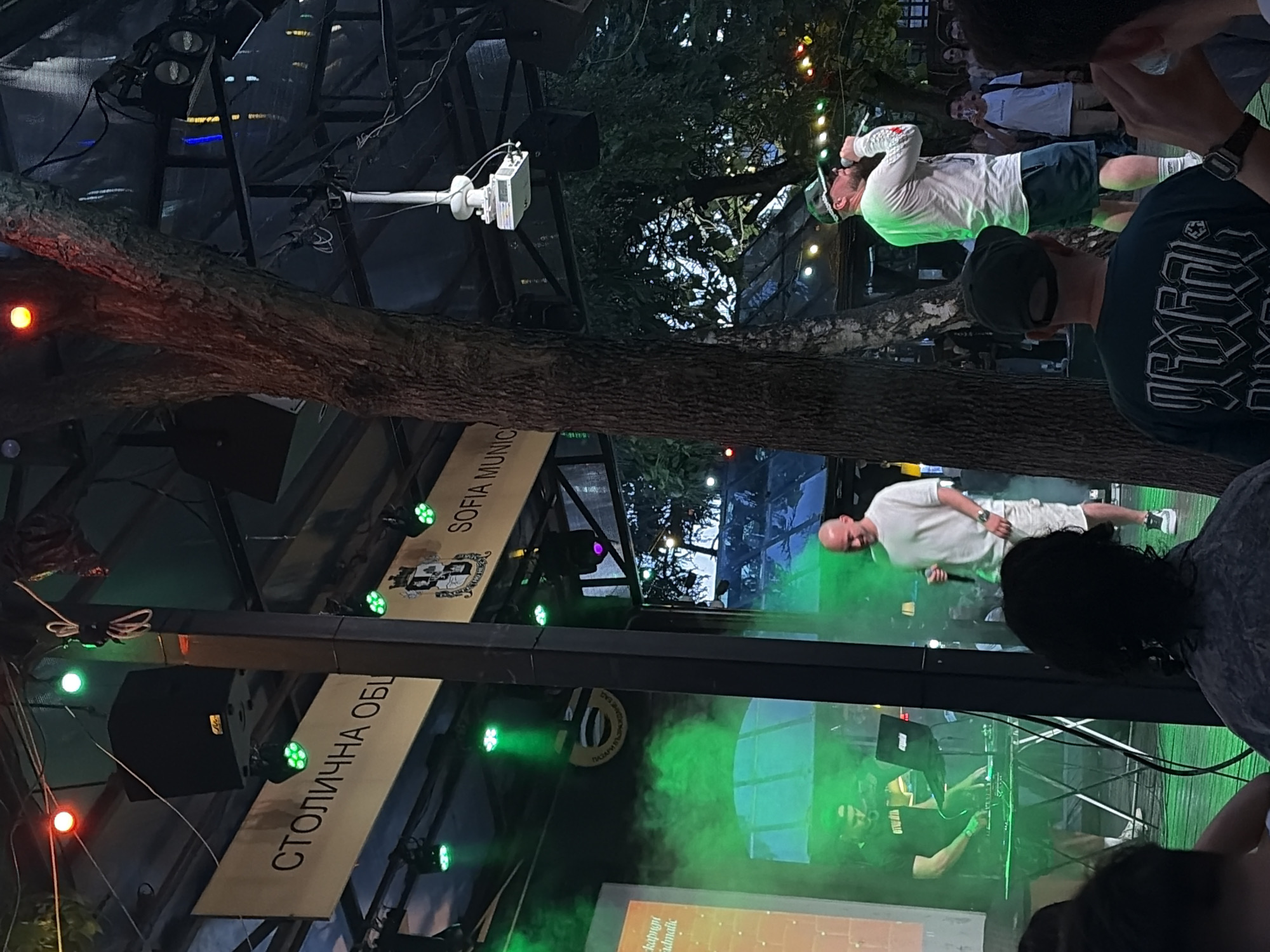 DJ set underway at a covered outdoor event