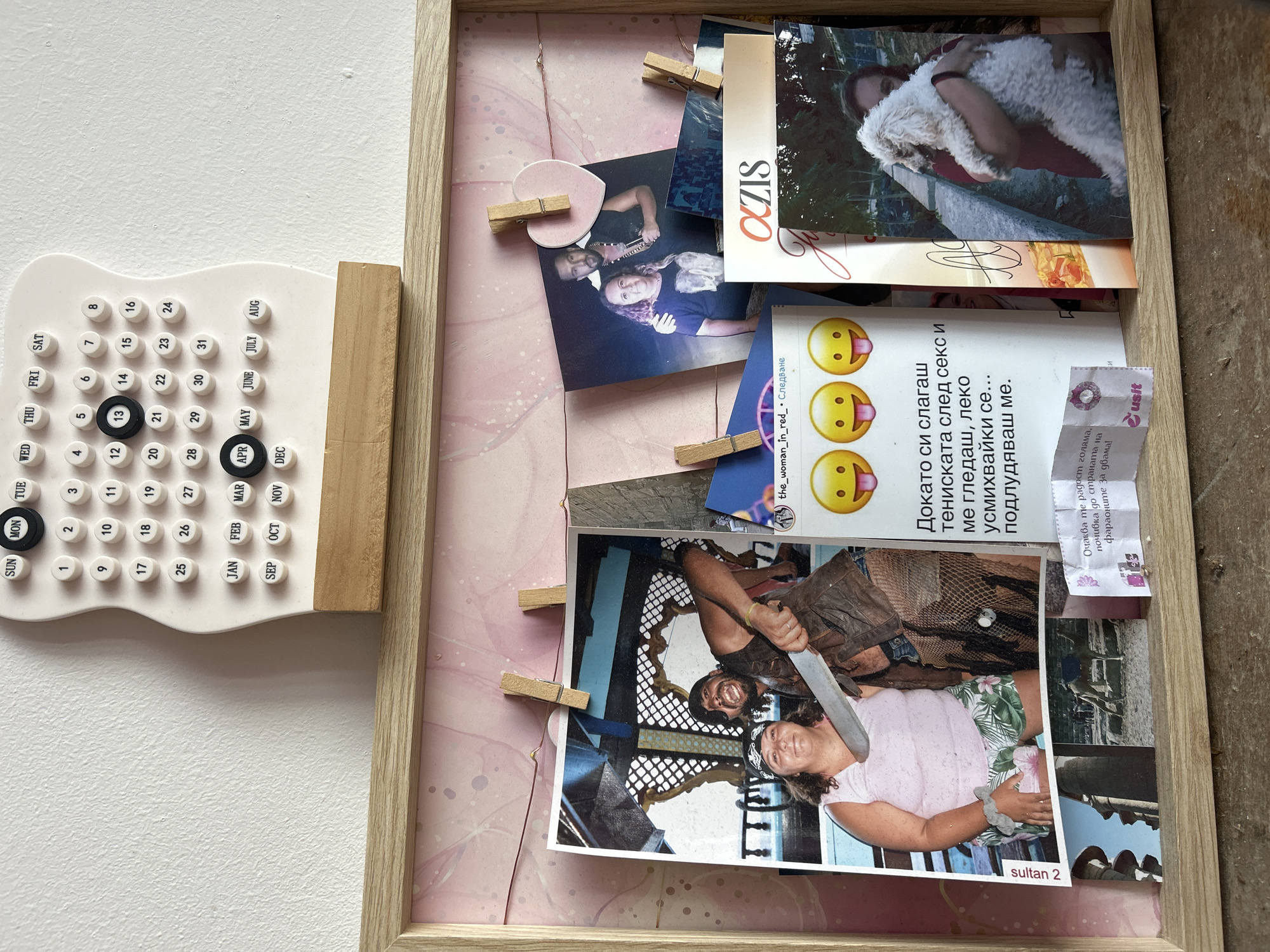 Photo bulletin board spotted next to April calendar in Sofia