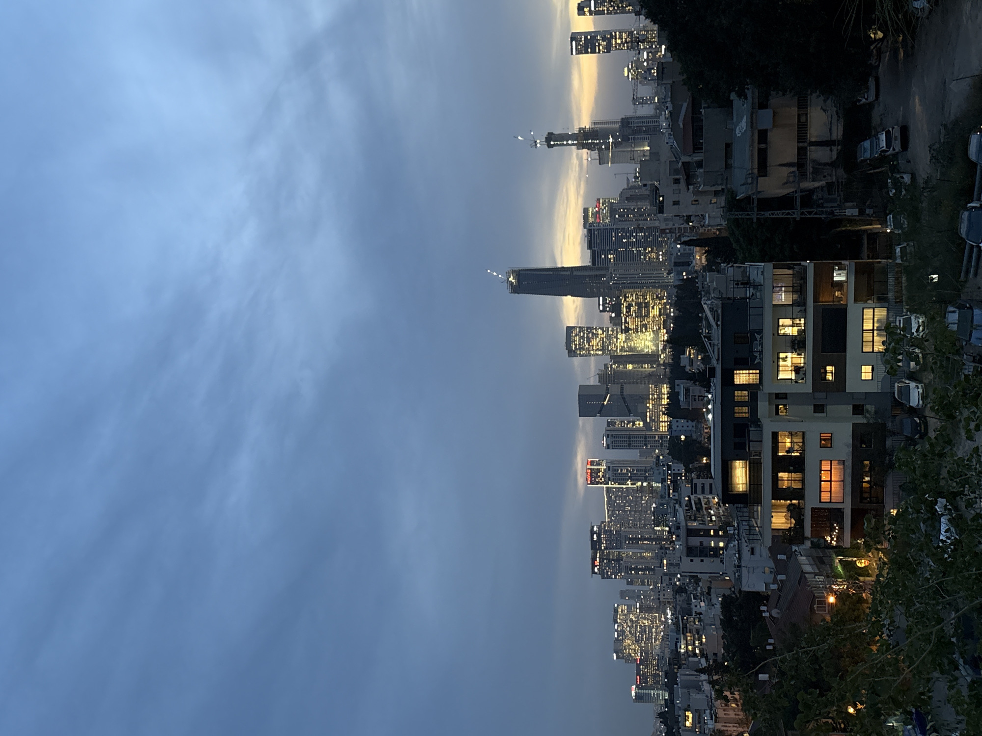 Evening scenes captured in Givatayim include decorated cactus, residential views