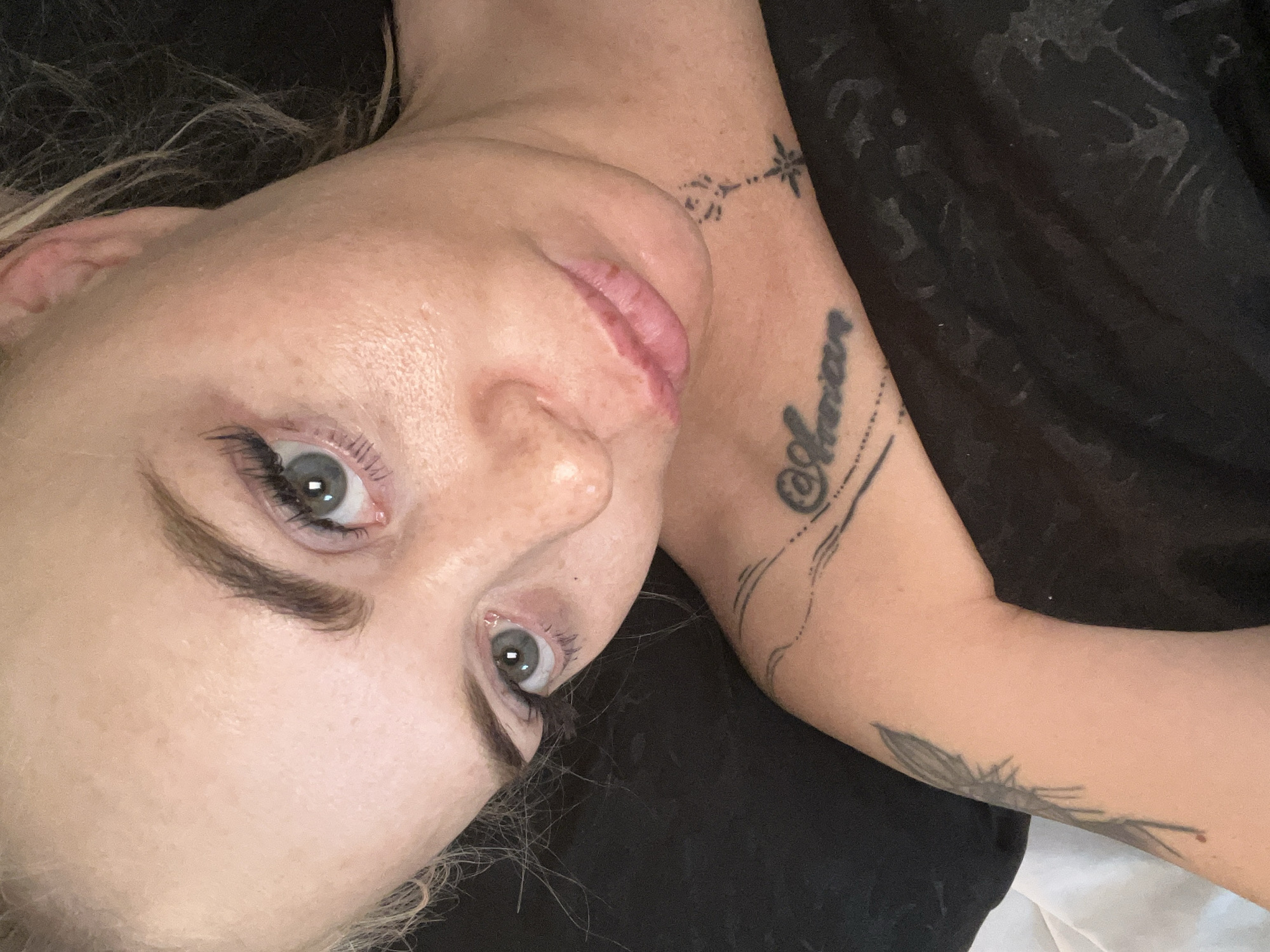 Overhead selfie series, lying down, multiple angles and expressions
