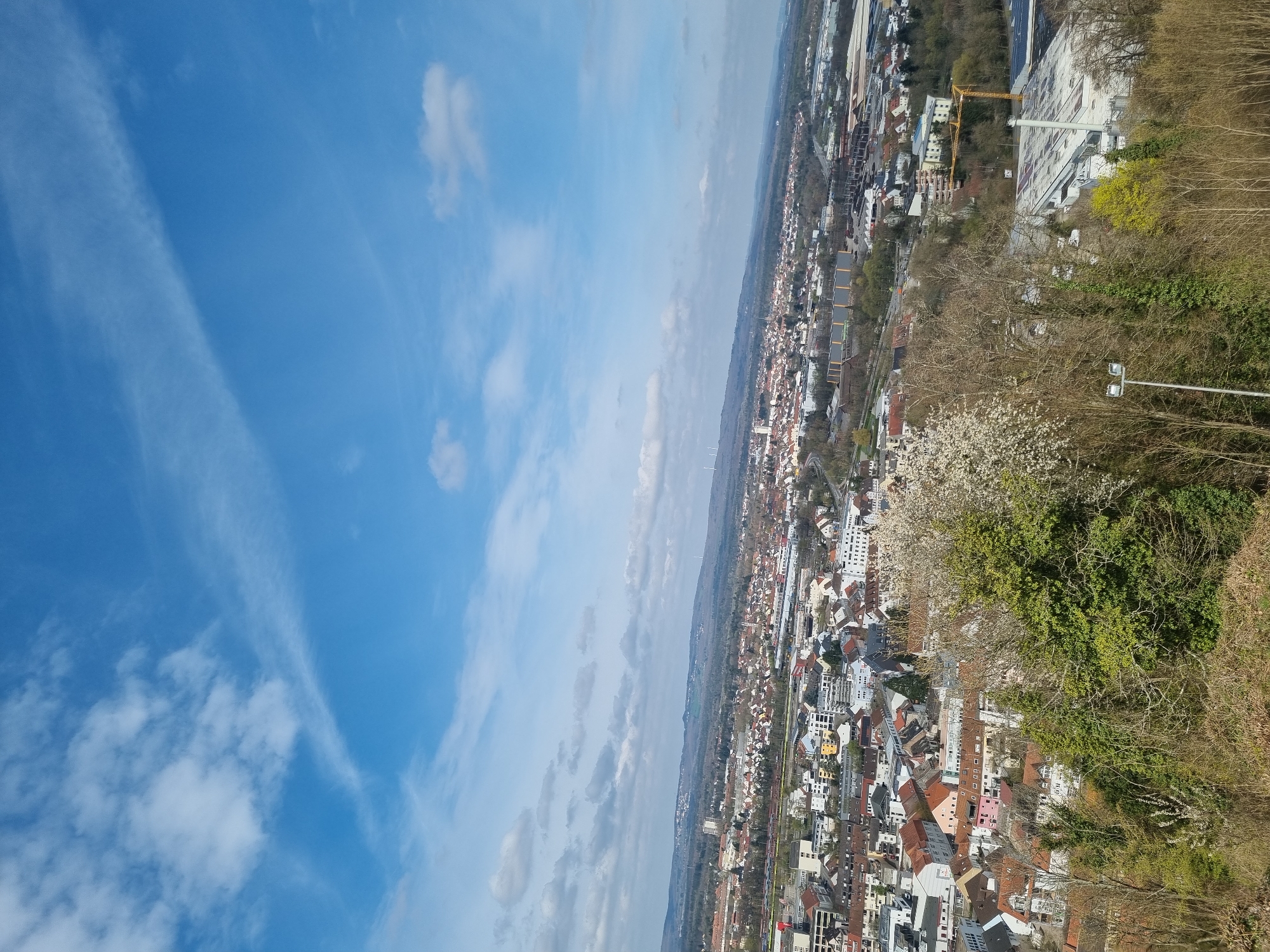 Visitors explore historic Schlossberg Caves and overlooks in Homburg