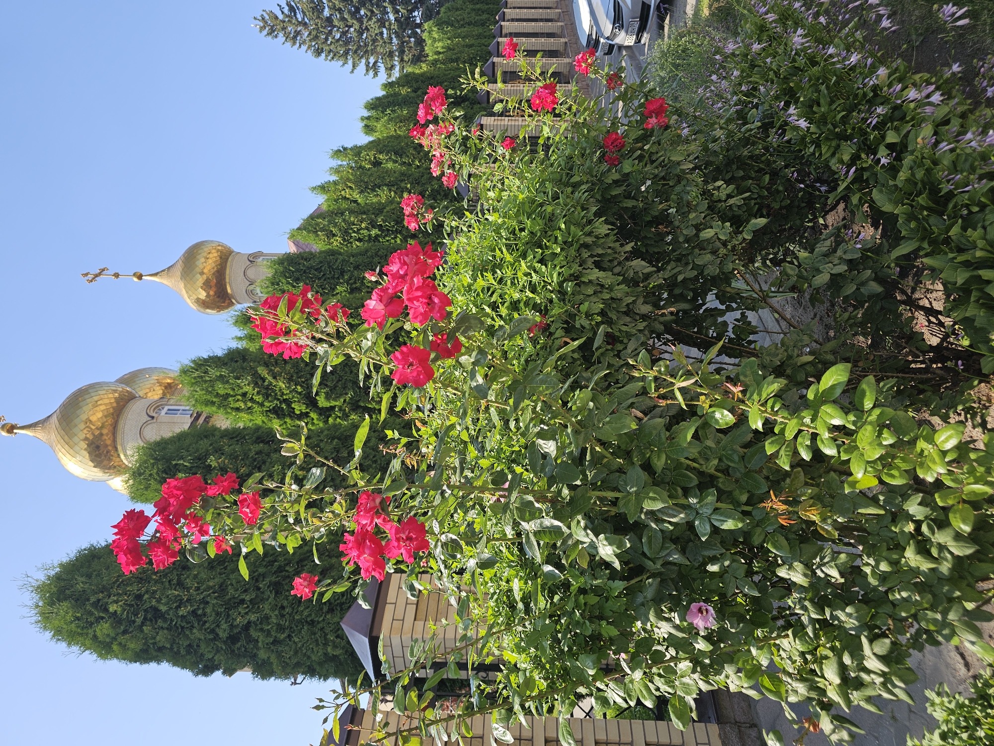 Churches and a Gagarin monument on a sunny Cherkessk afternoon