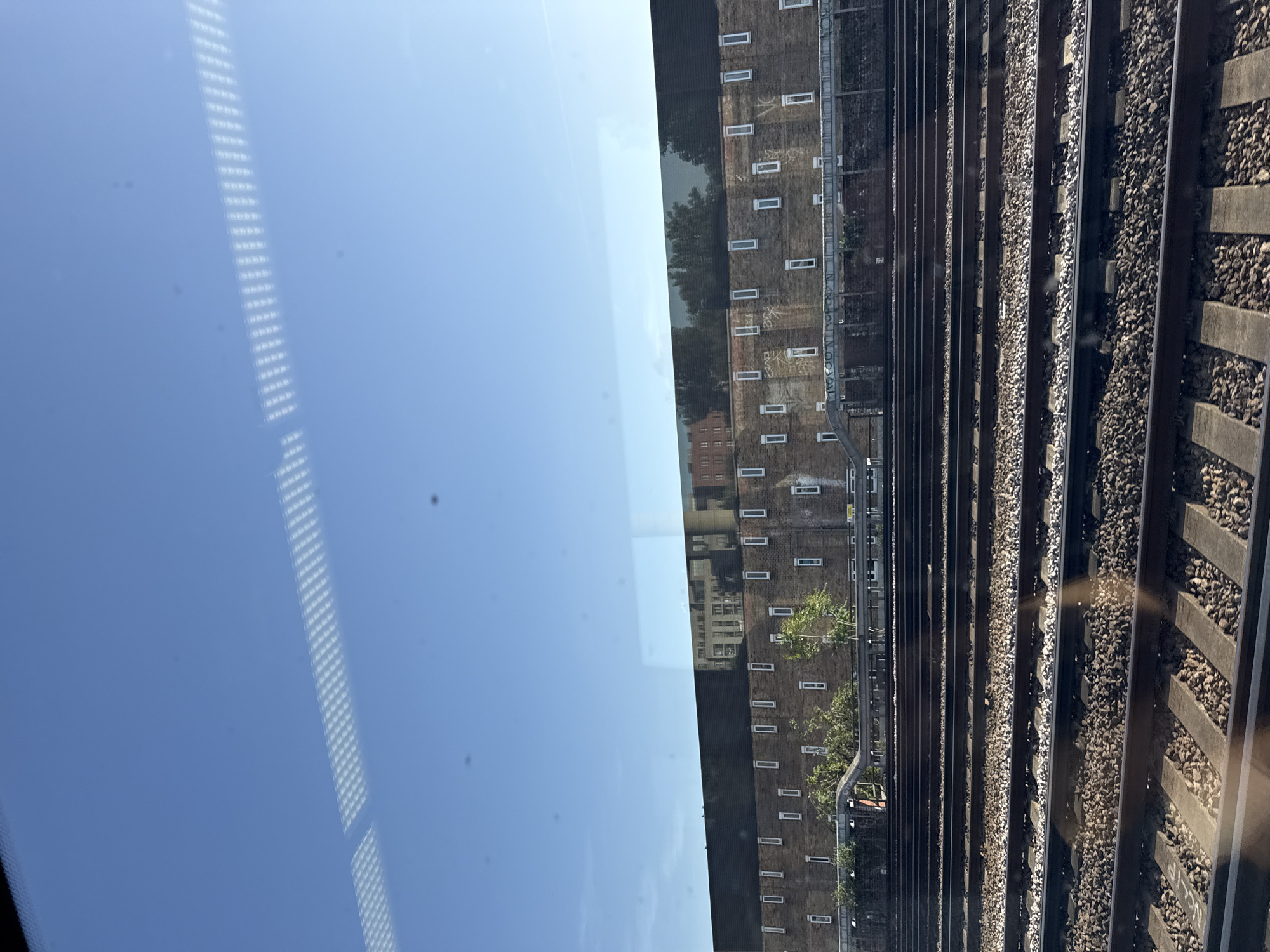 Train passenger observes passing Southeastern service and railway infrastructure