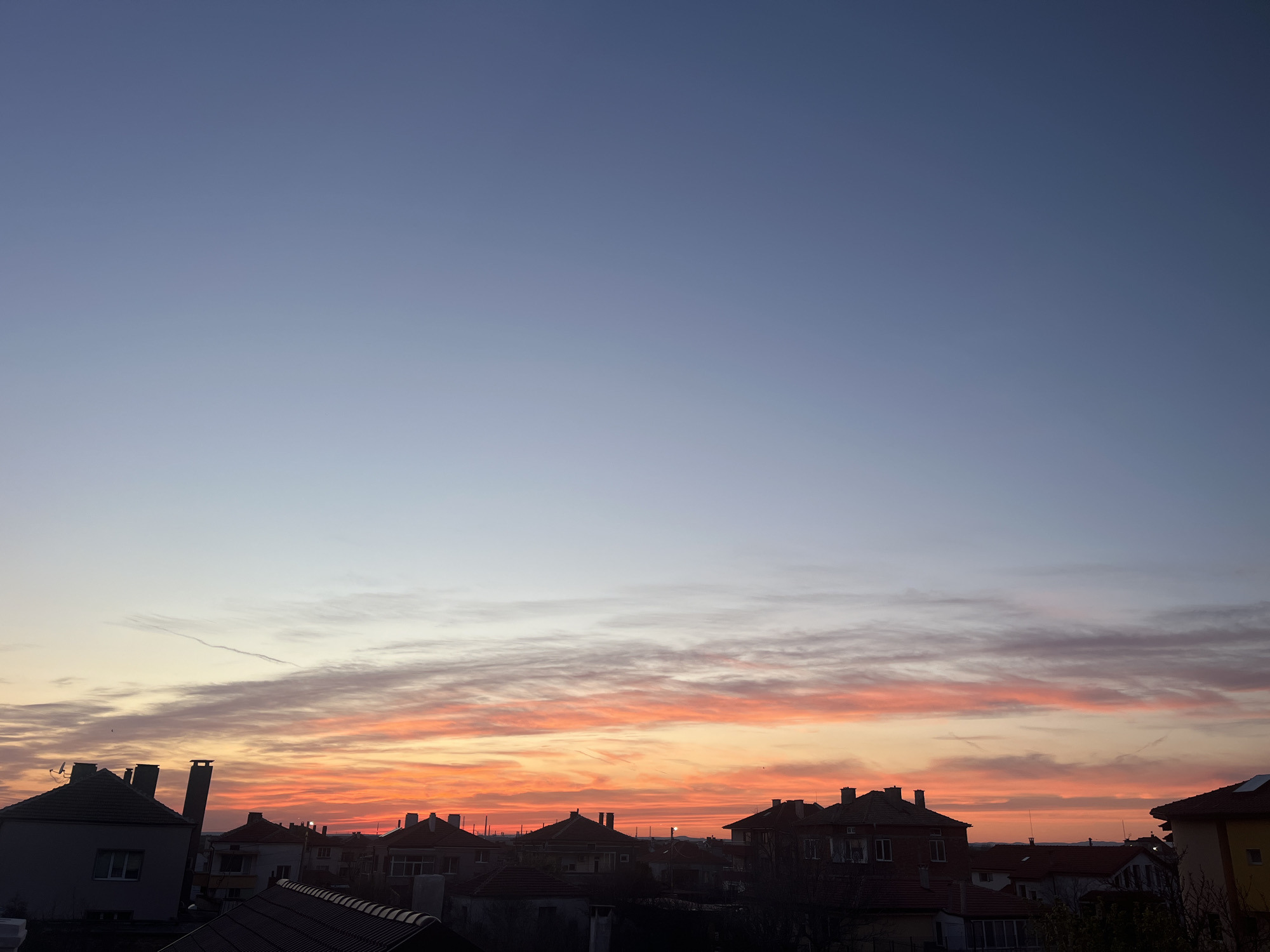 Colorful sunset observed over city skyline April 6