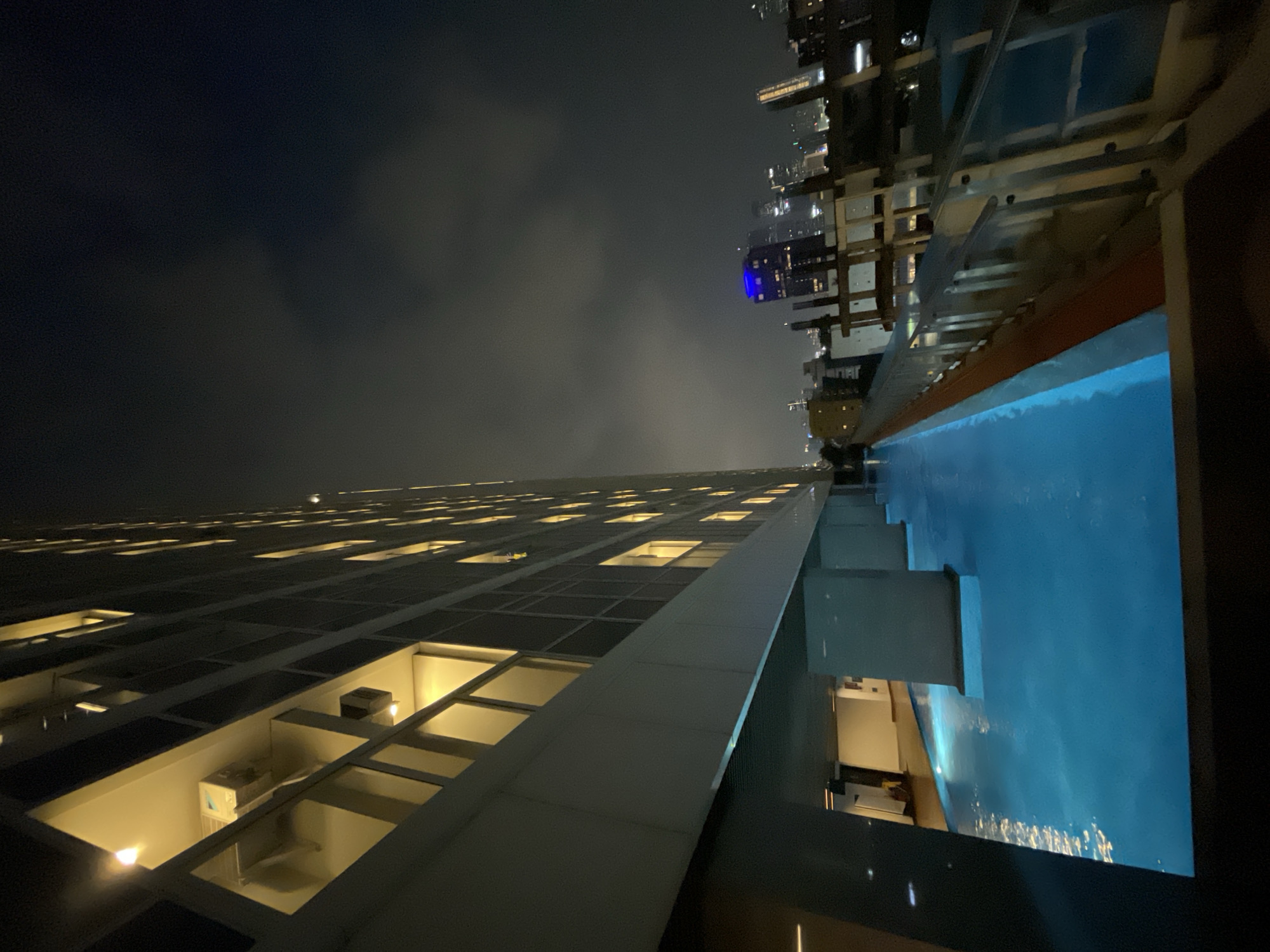 Rooftop pool evening in Central Jakarta with city views