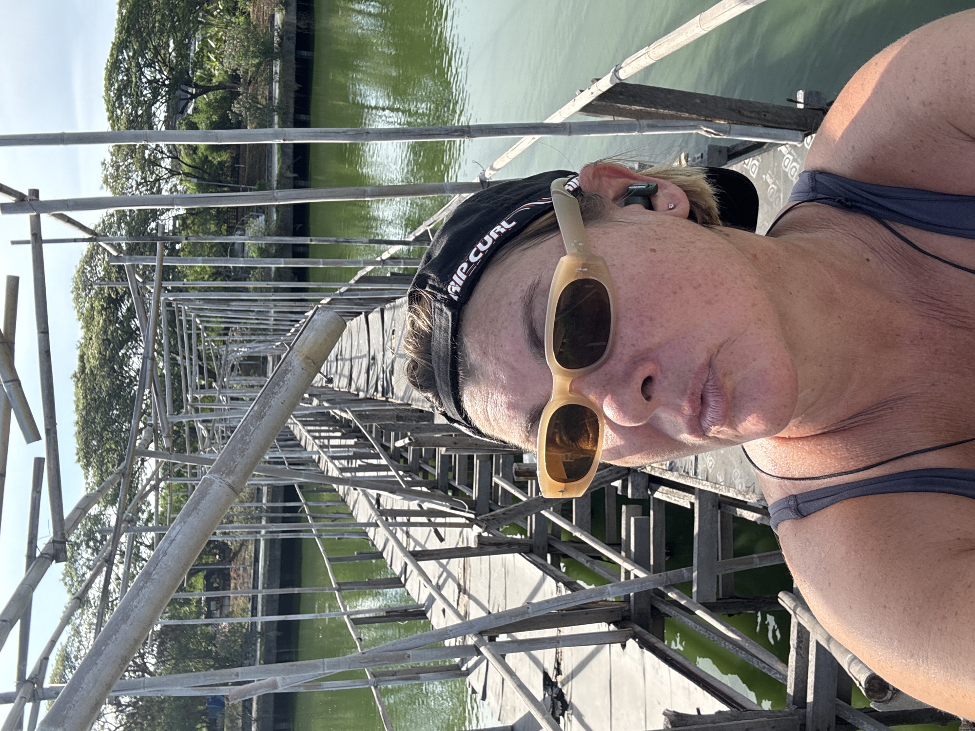 Tourists document deteriorating bridges and wildlife in Baan Chaweng