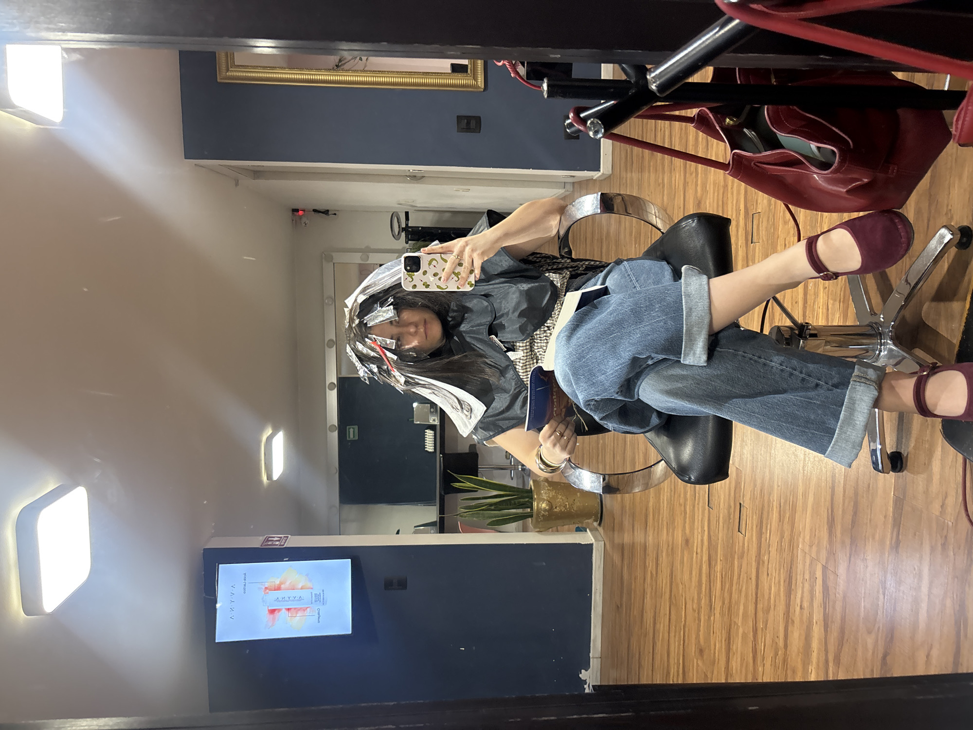 Woman receives hair treatment at Puebla salon