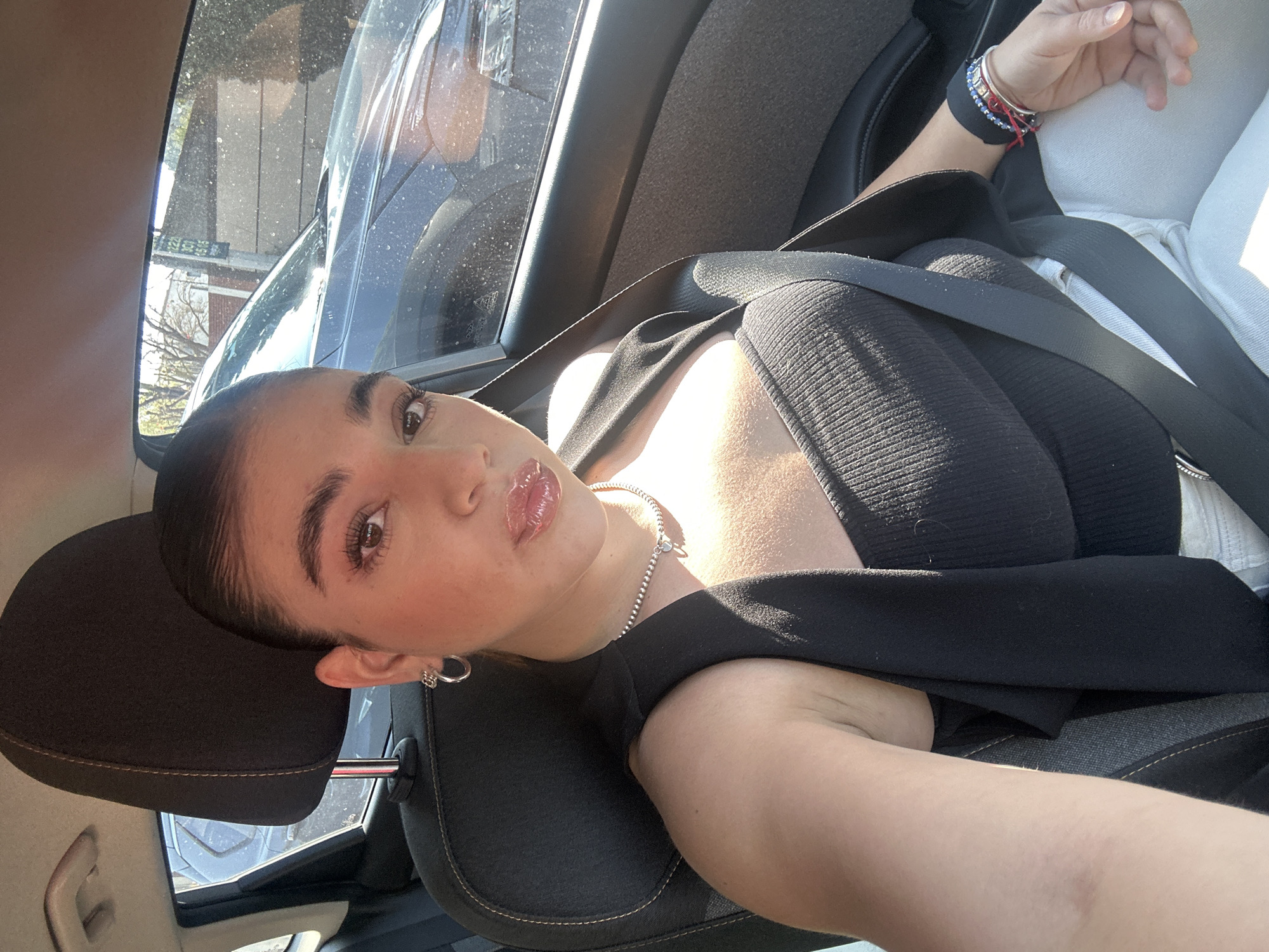 Woman photographed in car in Puebla, Mexico