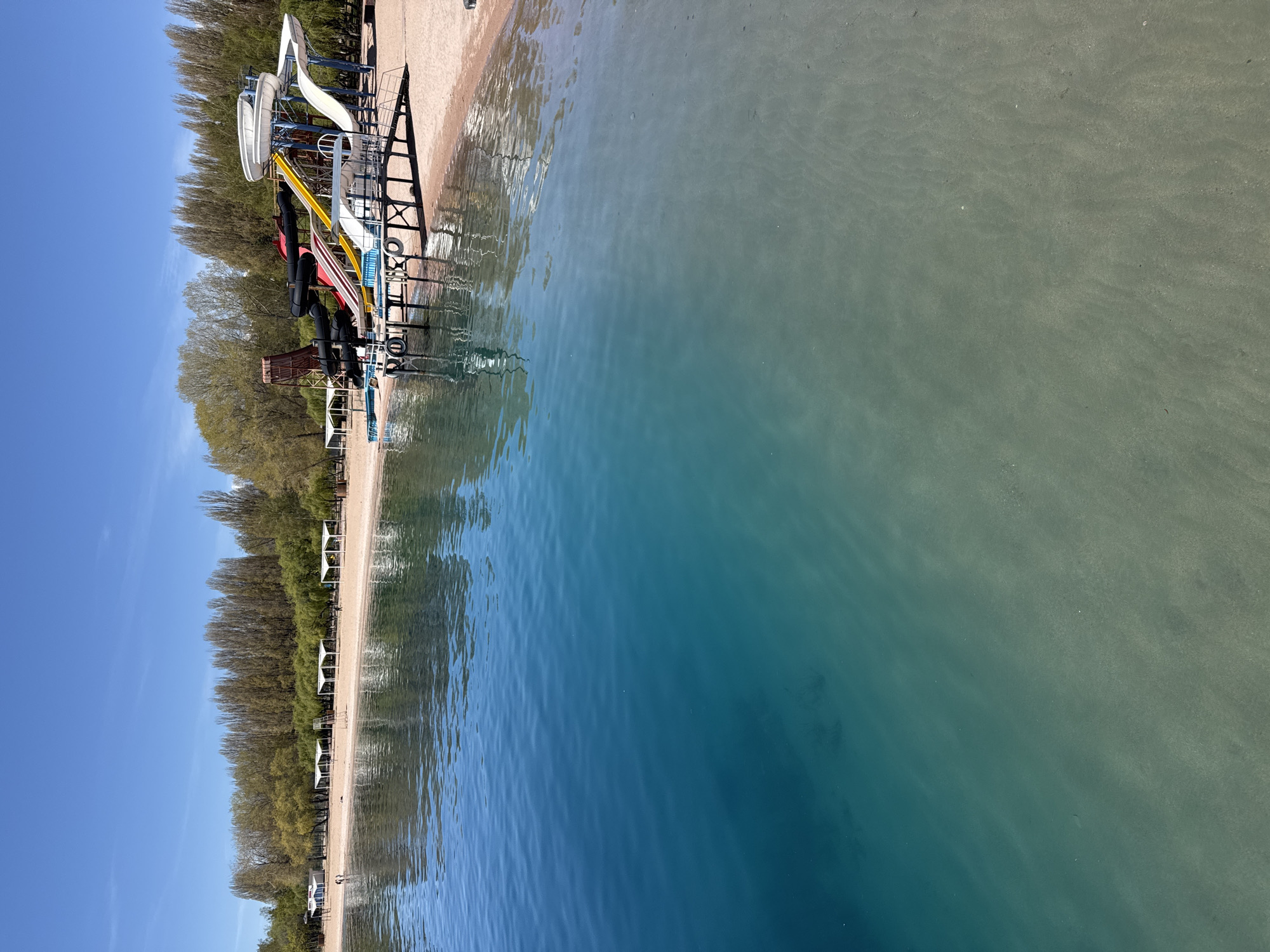 Morning lakeside tourism documented at Kyrgyzstan's Lake Issyk-Kul resort