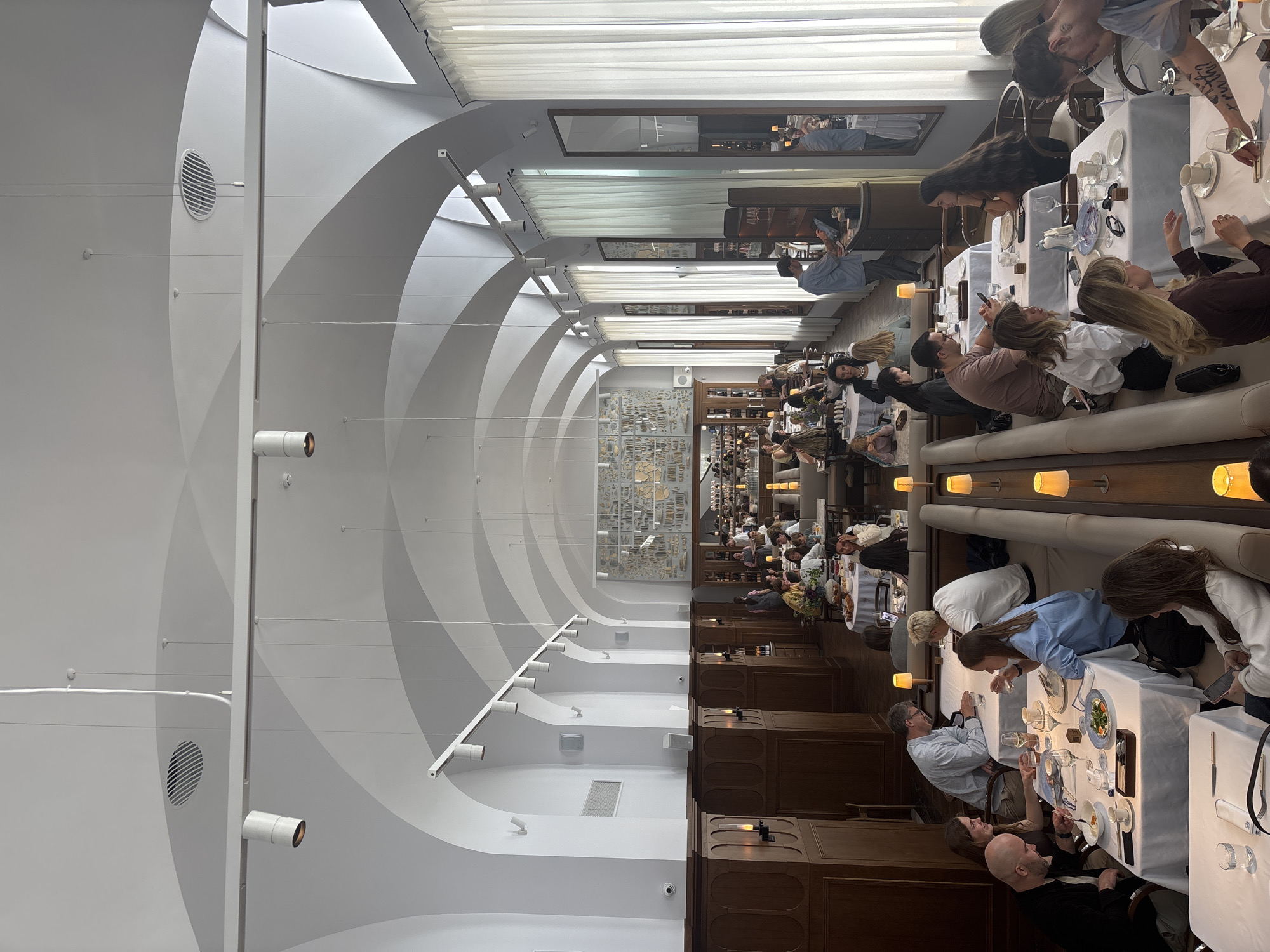 Rainy Saint Petersburg morning: trams, wet streets, and a vaulted restaurant