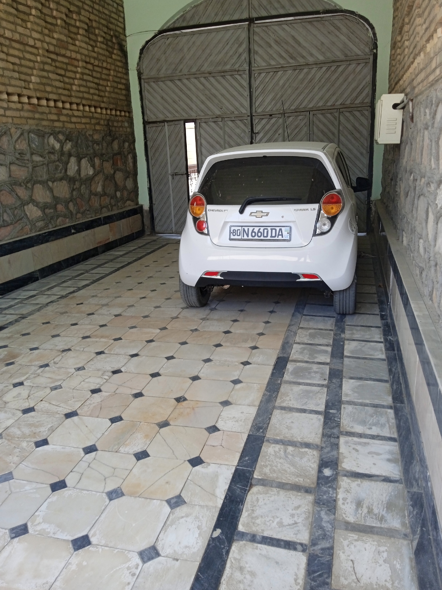 Garage parking and staircase detail at a residential property