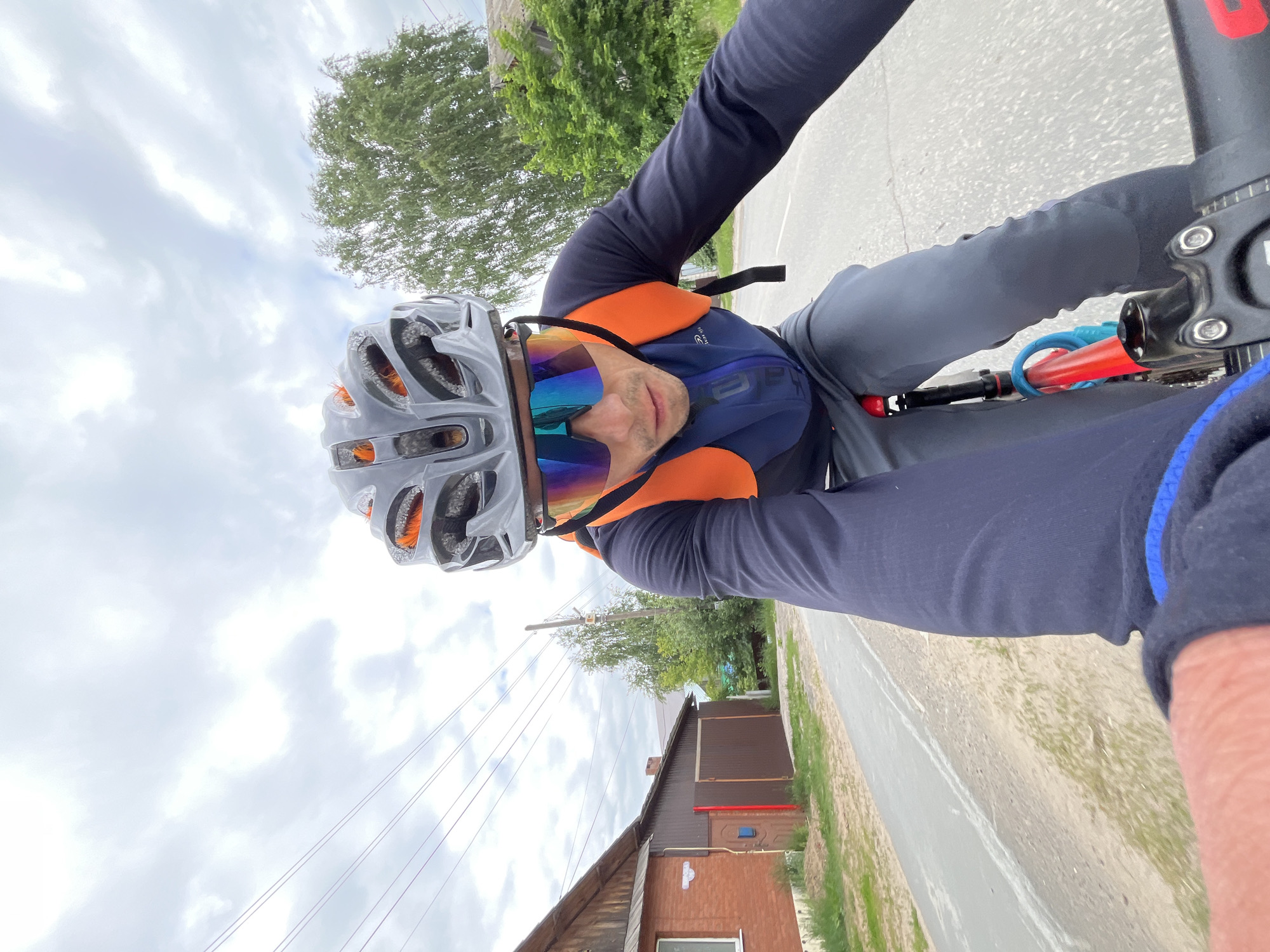 Cyclist rides, poses for photos on Chaikovsky road