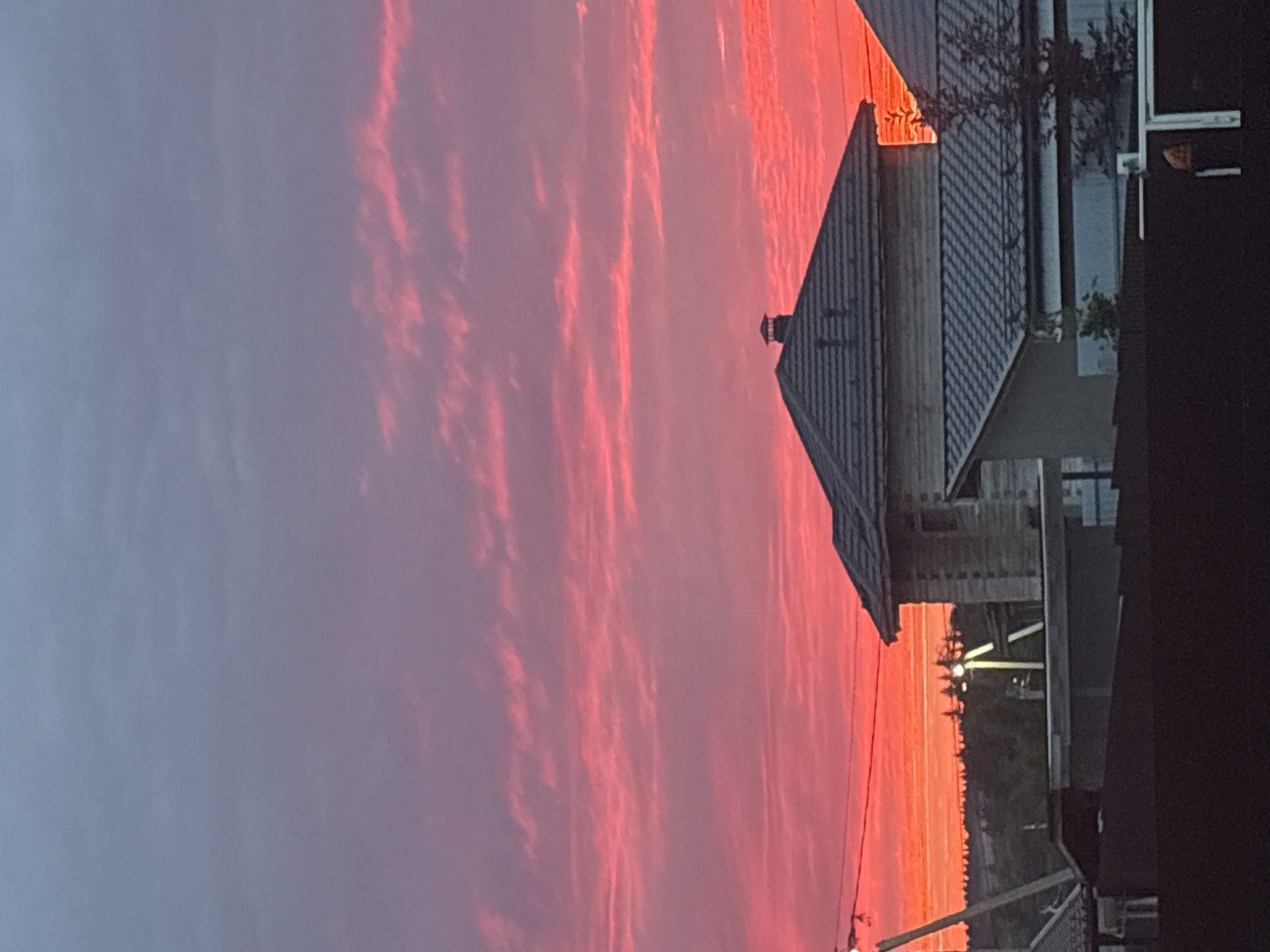 Vivid sunset lights up the rooftops of Dolce Vita KP