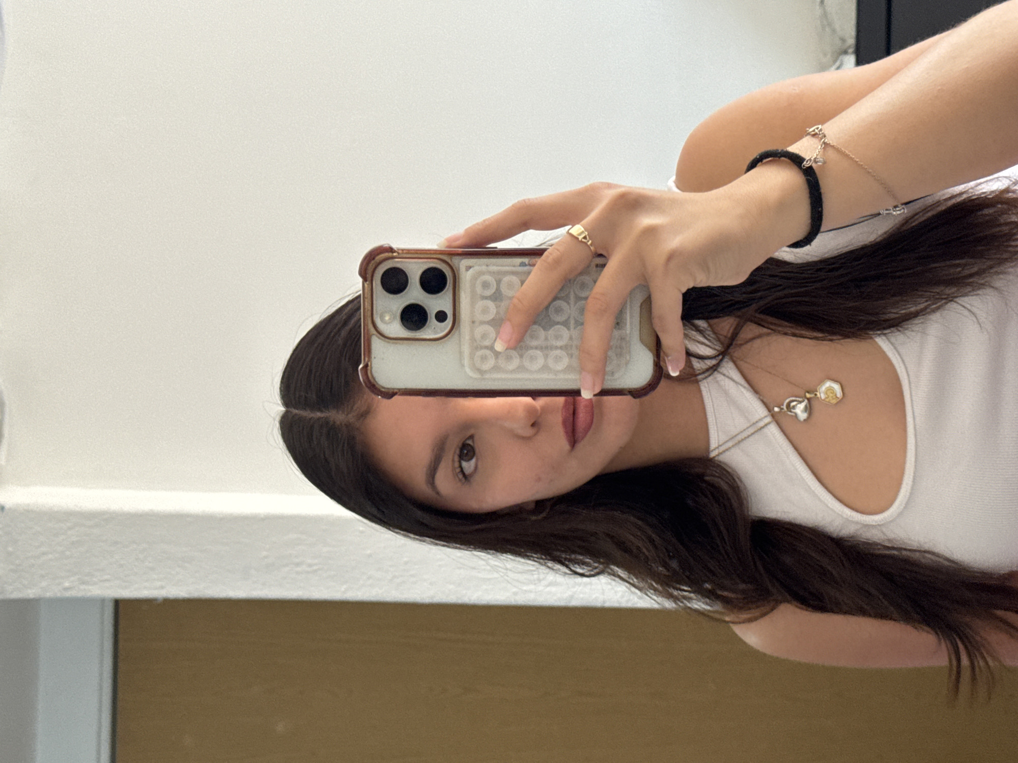 Woman takes mirror selfie in Paraje el Ciruelar, Mexico