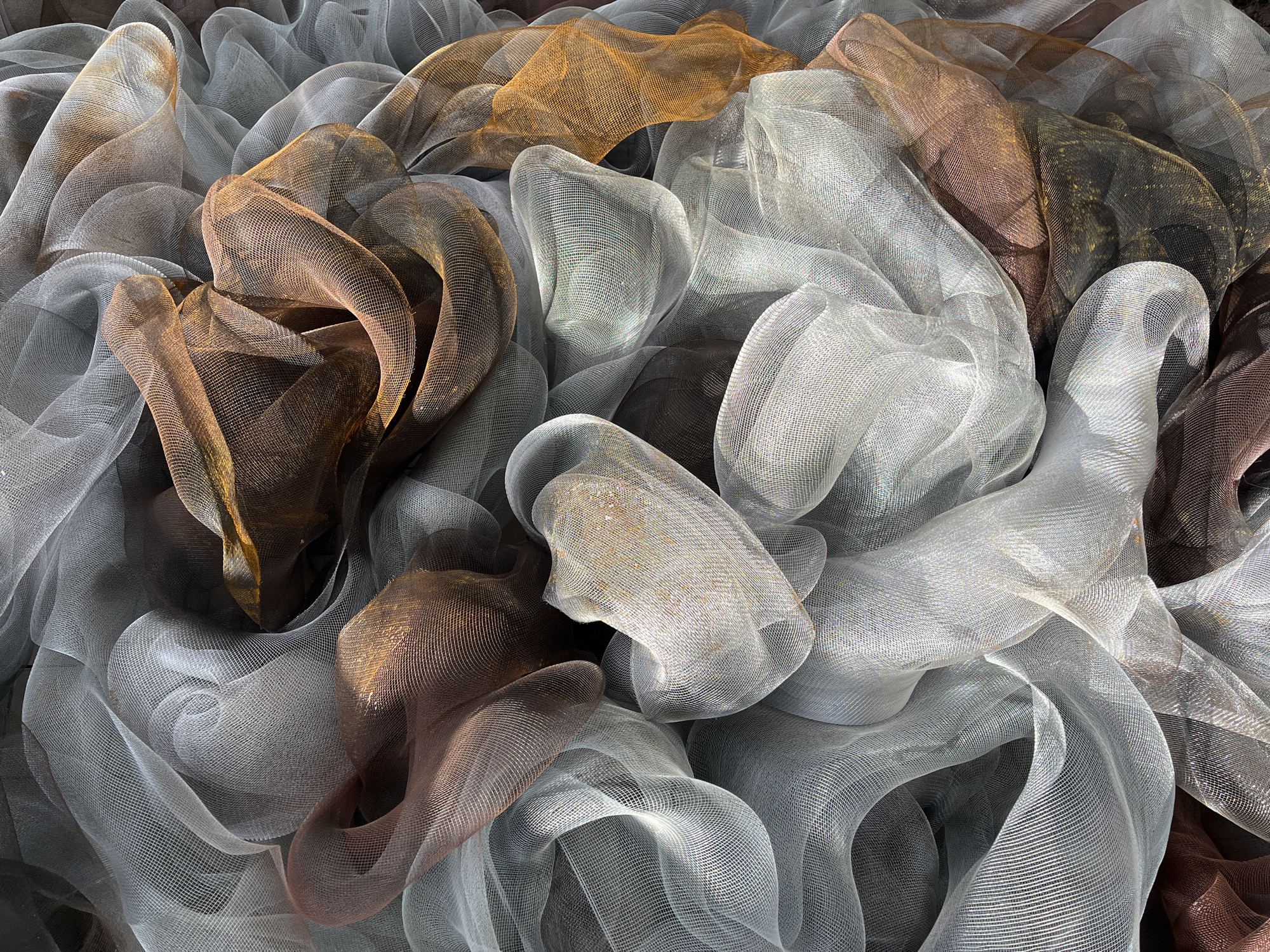 Metallic mesh materials arranged in artistic display in Krasnoyarsk