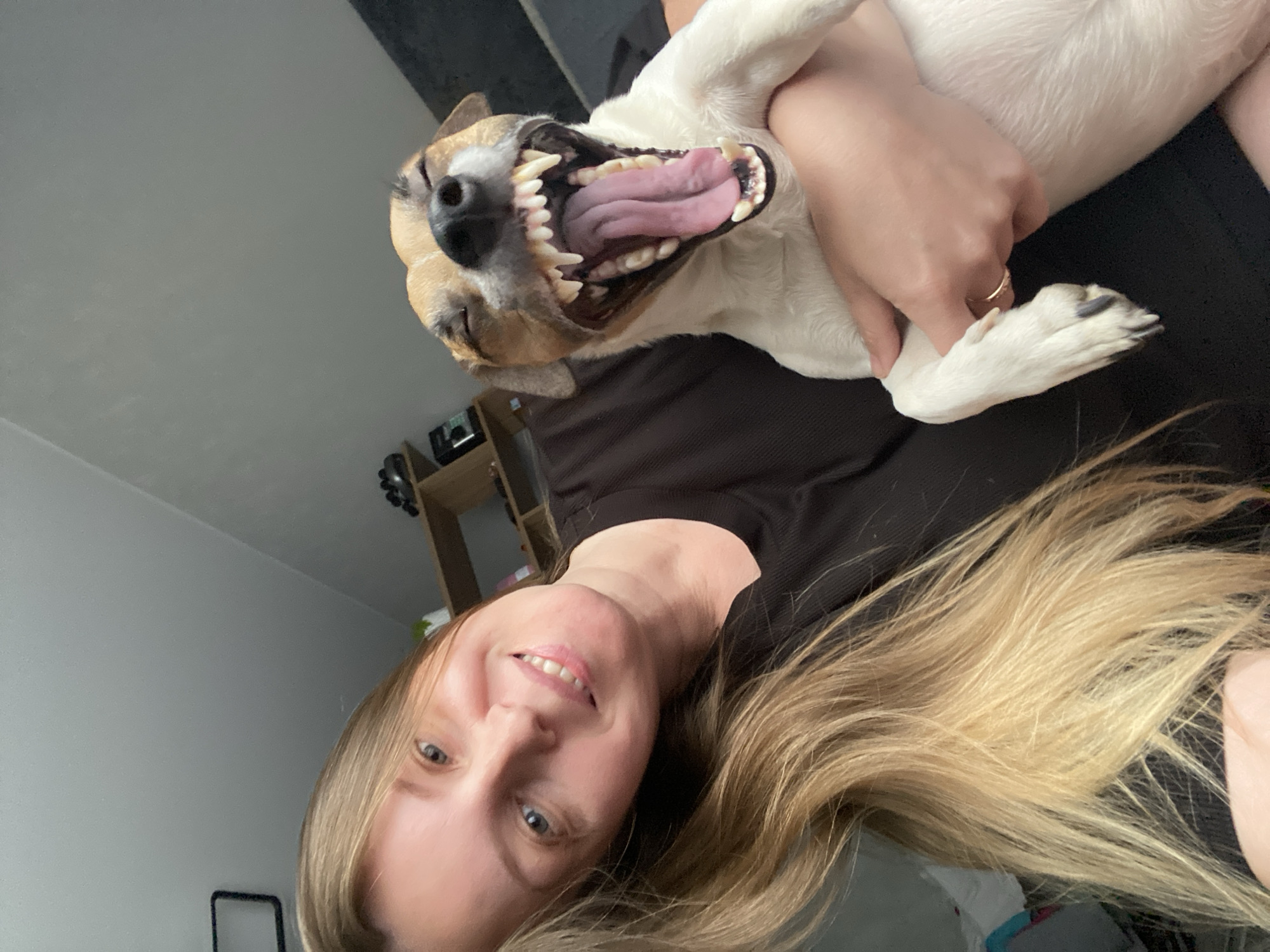 Woman documents morning routine with dog, flowers in Noviy