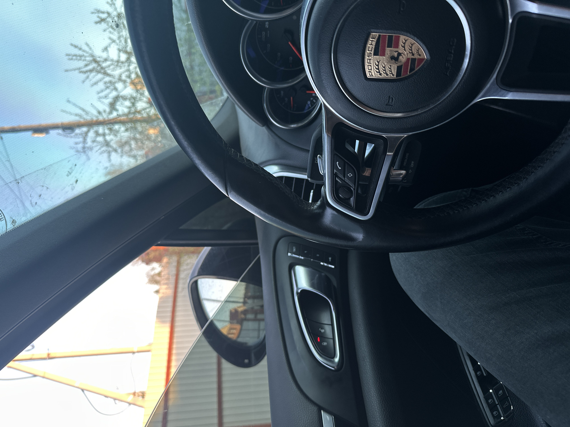 Porsche interior and lakeside building documented in dual memories