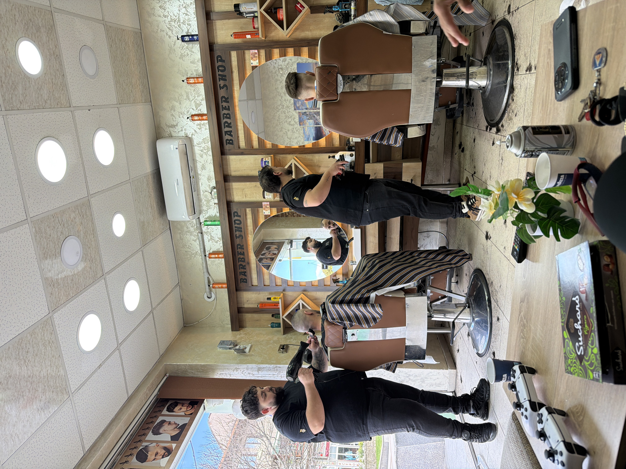 Spring afternoon scenes captured in Panagyurishte barbershop and streets