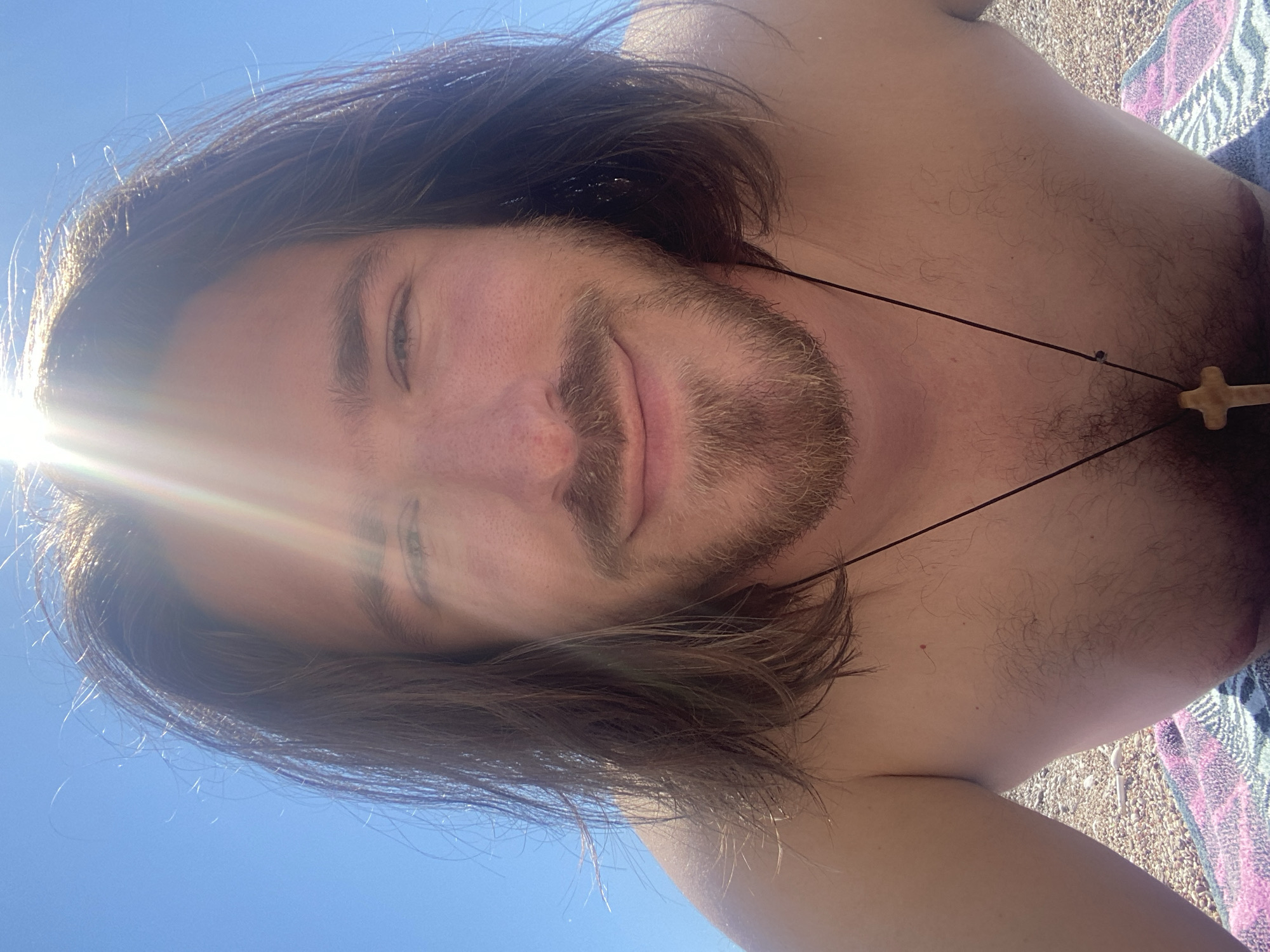 Man enjoys sunny beach day in Sutomore, Montenegro