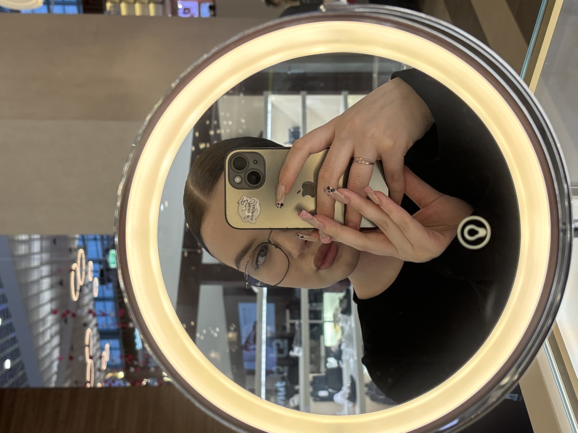 Retail worker takes selfies during break at Russian mall