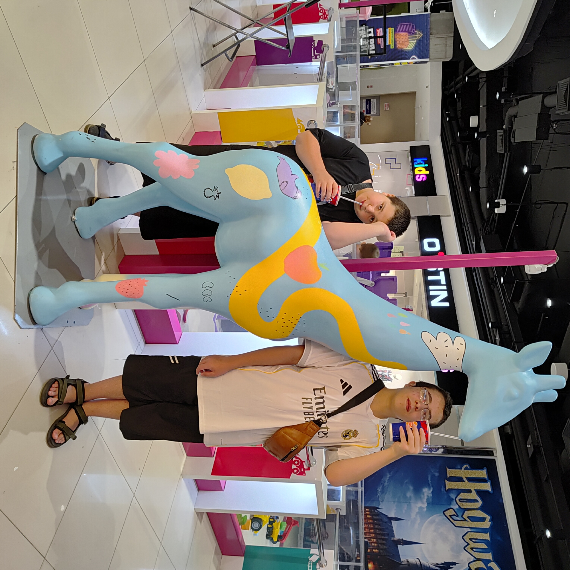 Ufa mall with themed displays, Lego dioramas, and Harry Potter decor