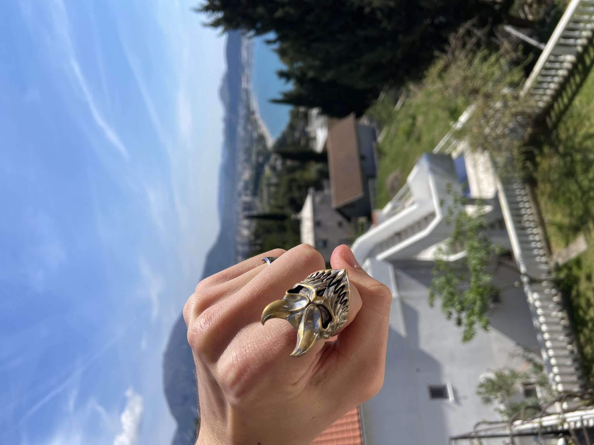 Man takes selfies on balcony in Šušanj, Montenegro