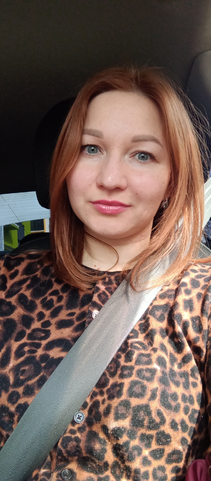 Woman documents shopping trip through urban commercial district