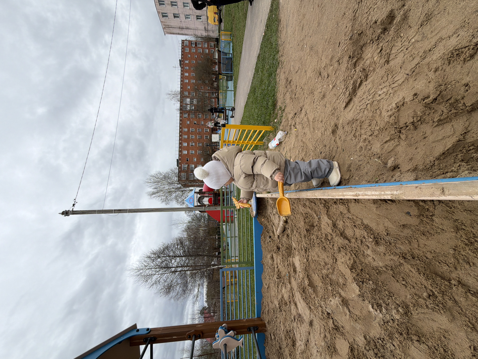 Mother and child enjoy playground time in Reshetnikovo