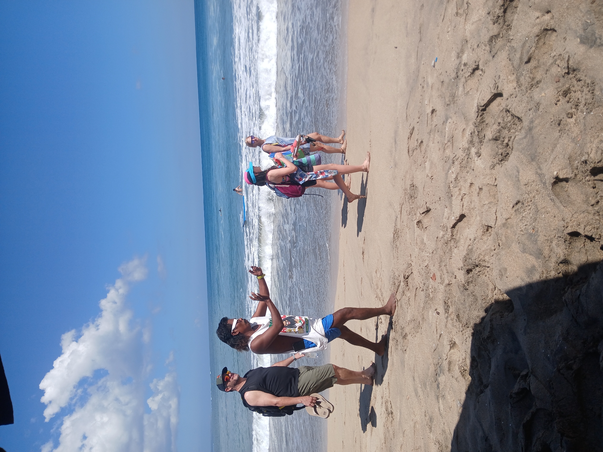 Kuta Beach in full swing on a clear Bali morning