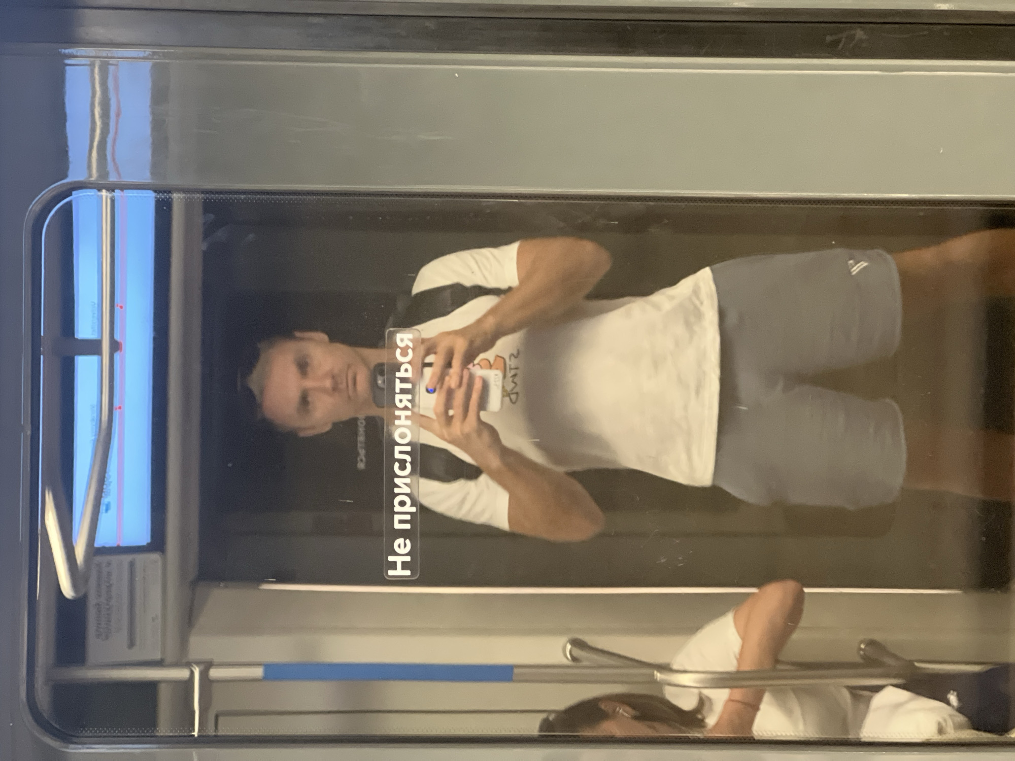 Everyday scene inside a Moscow Metro car