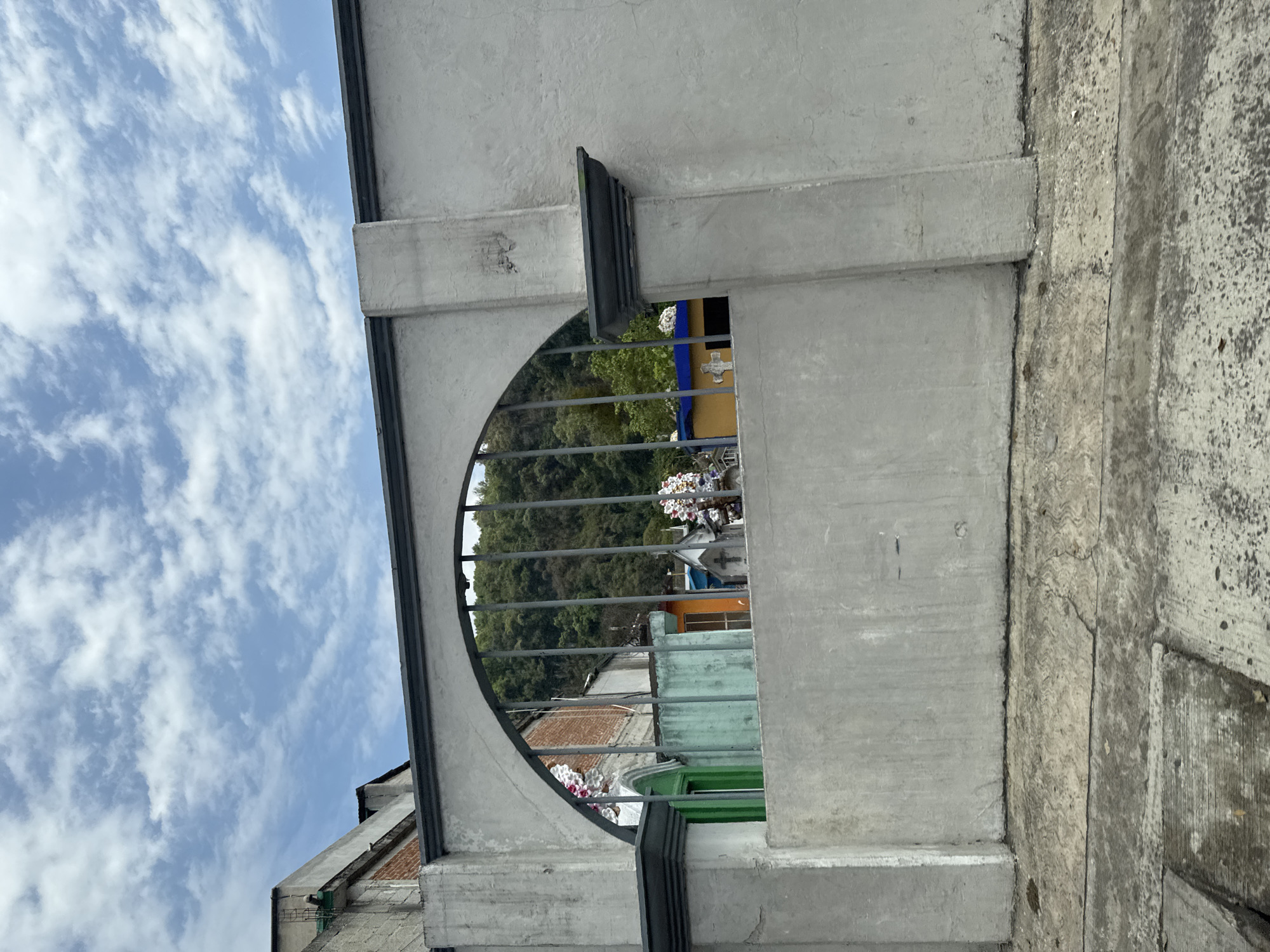 Concrete arched structure with metal bars documented in Jilotepec